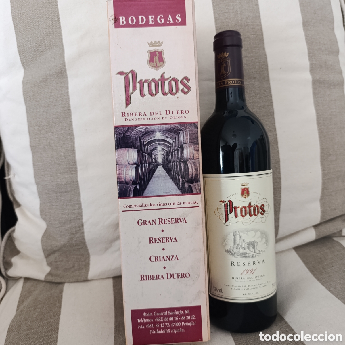 Collection of wines and liquors: BOTELLA DE VINO PROTOS, RESERVA 1991. D.O. RIBERA DE DUERO.PE&Ntilde;AFIEL. 75 cl.EN SU CAJA,NUMERADA.