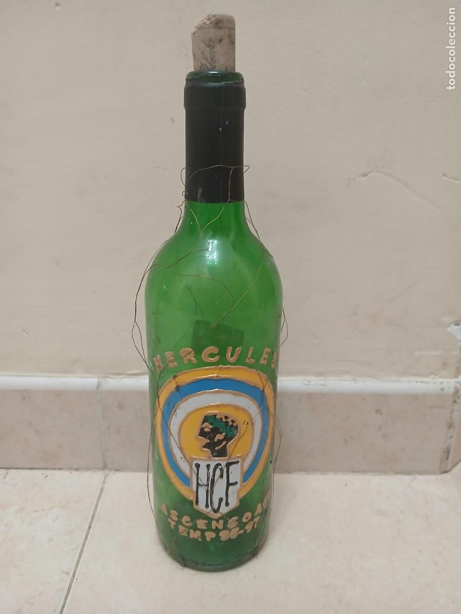 Sammlung von Weinen und Lik&ouml;ren: Botella vac&iacute;a ascenso h&eacute;rcules 96/97