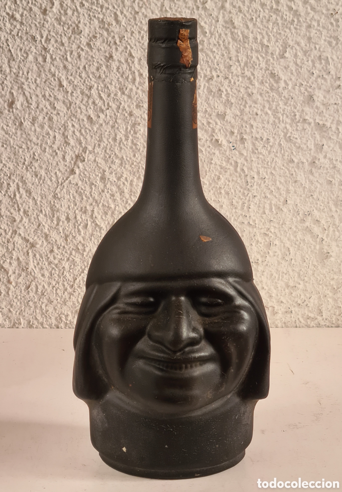 Collection of wines and liquors: Botella Cabeza Ind&iacute;gena Aguardiente Pisco Licor de los Incas Destilerias Nogueras Comas - Precintada