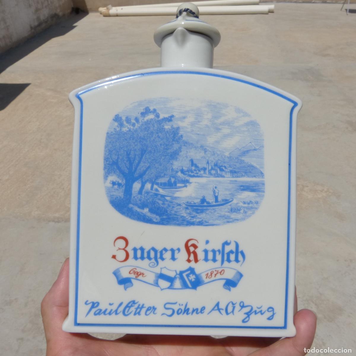 Sammlung von Weinen und Lik&ouml;ren: Curiosa botella de porcelana, licor de cerezas suizo, langenthal, suisse, 20,5cm, 646gr.