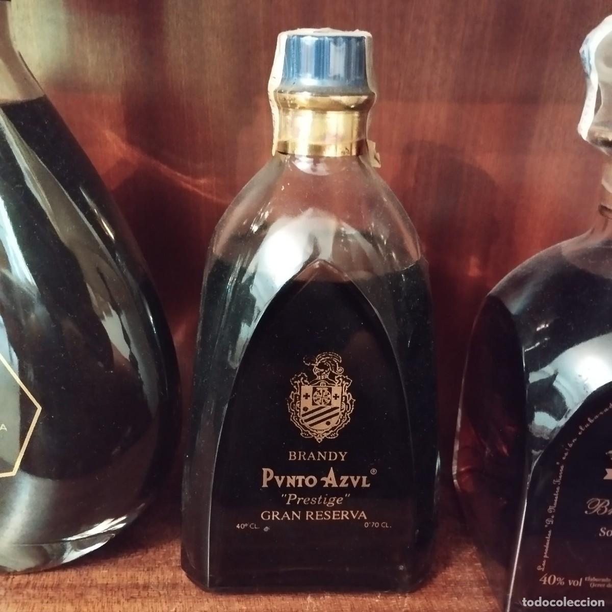 Coleccionismo de vinos y licores: Brandy de Jerez Punto Azul Prestige Gran Reserva - Yuste - (lleno y precintado)