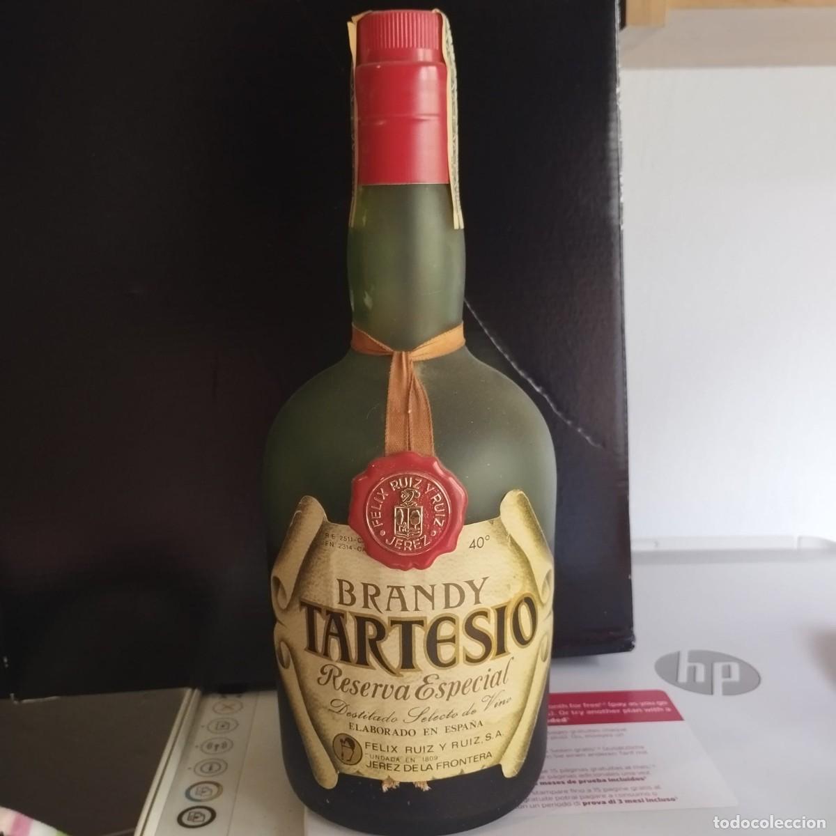 Coleccionismo de vinos y licores: Brandy de Jerez Tartesio Reserva especial (media botella por evaporaci&oacute;n y precintado)