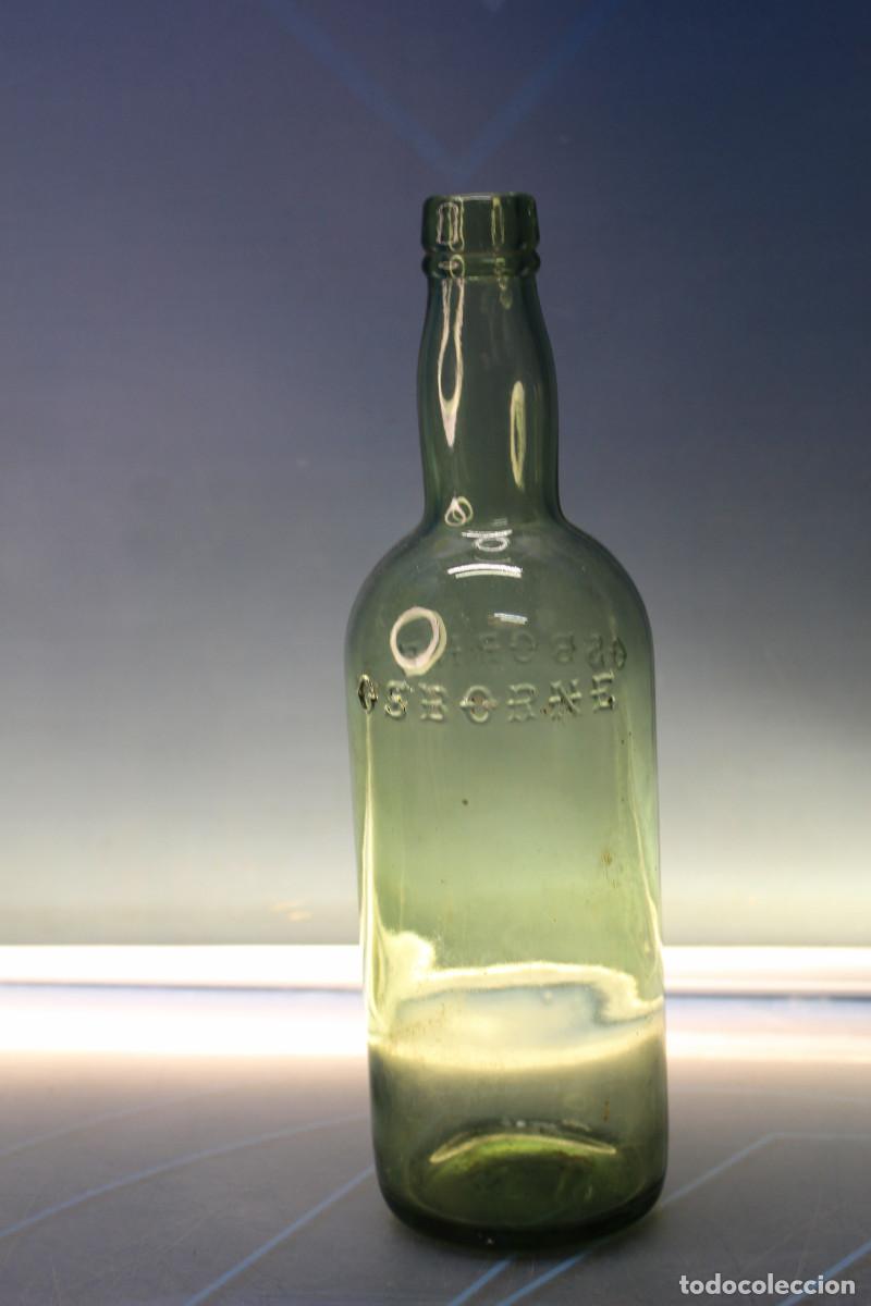 Collection of wines and liquors: Botella antigua Osborne, vidrio con relieve.