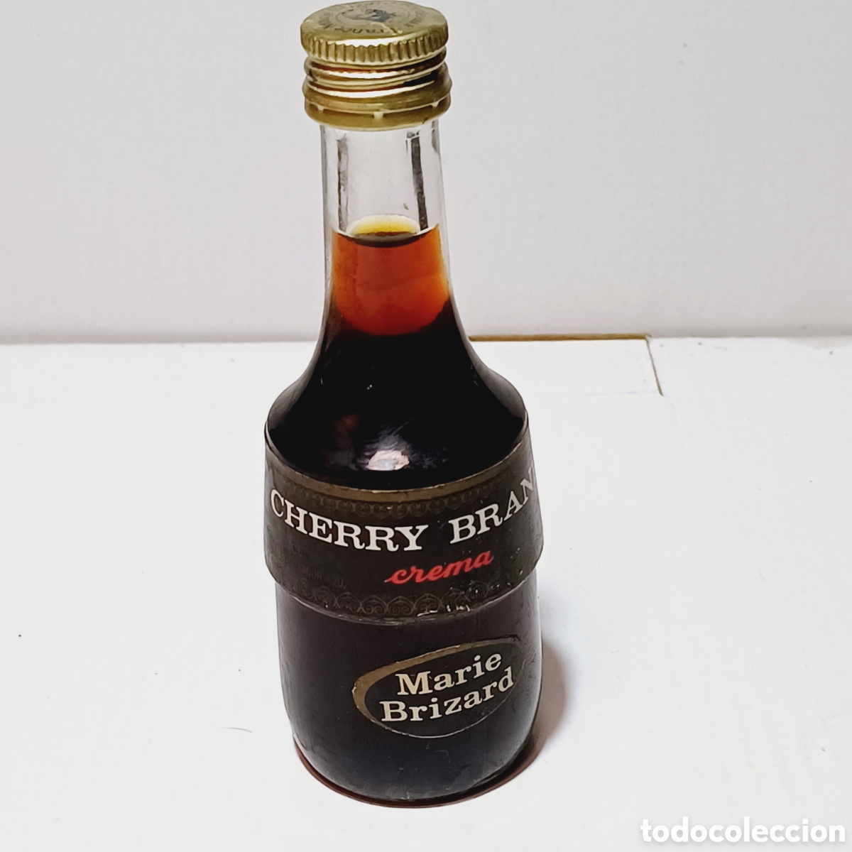 Coleccionismo de vinos y licores: Botella mini Cherry Brandy Liqueur Marie Brizard a&ntilde;os 80, de 3cl, miniatura botell&iacute;n, licor 11 cm