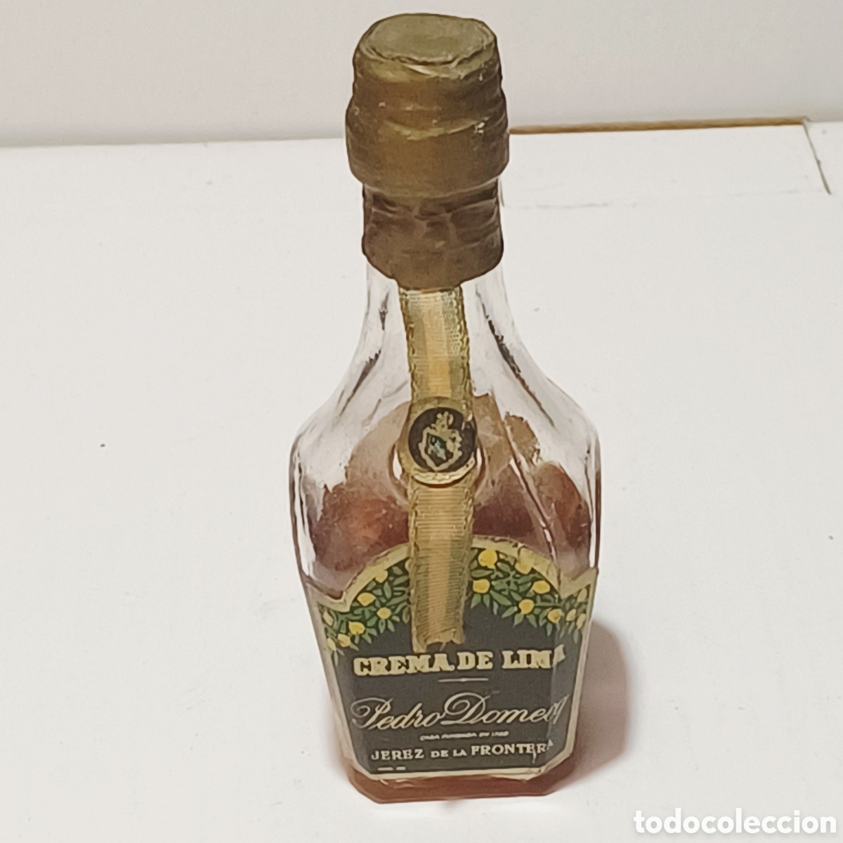 Coleccionismo de vinos y licores: Botella mini Miniatura Botellin Licor Crema Lima Pedro Domecq Jerez de la Frontera con evaporaci&oacute;n