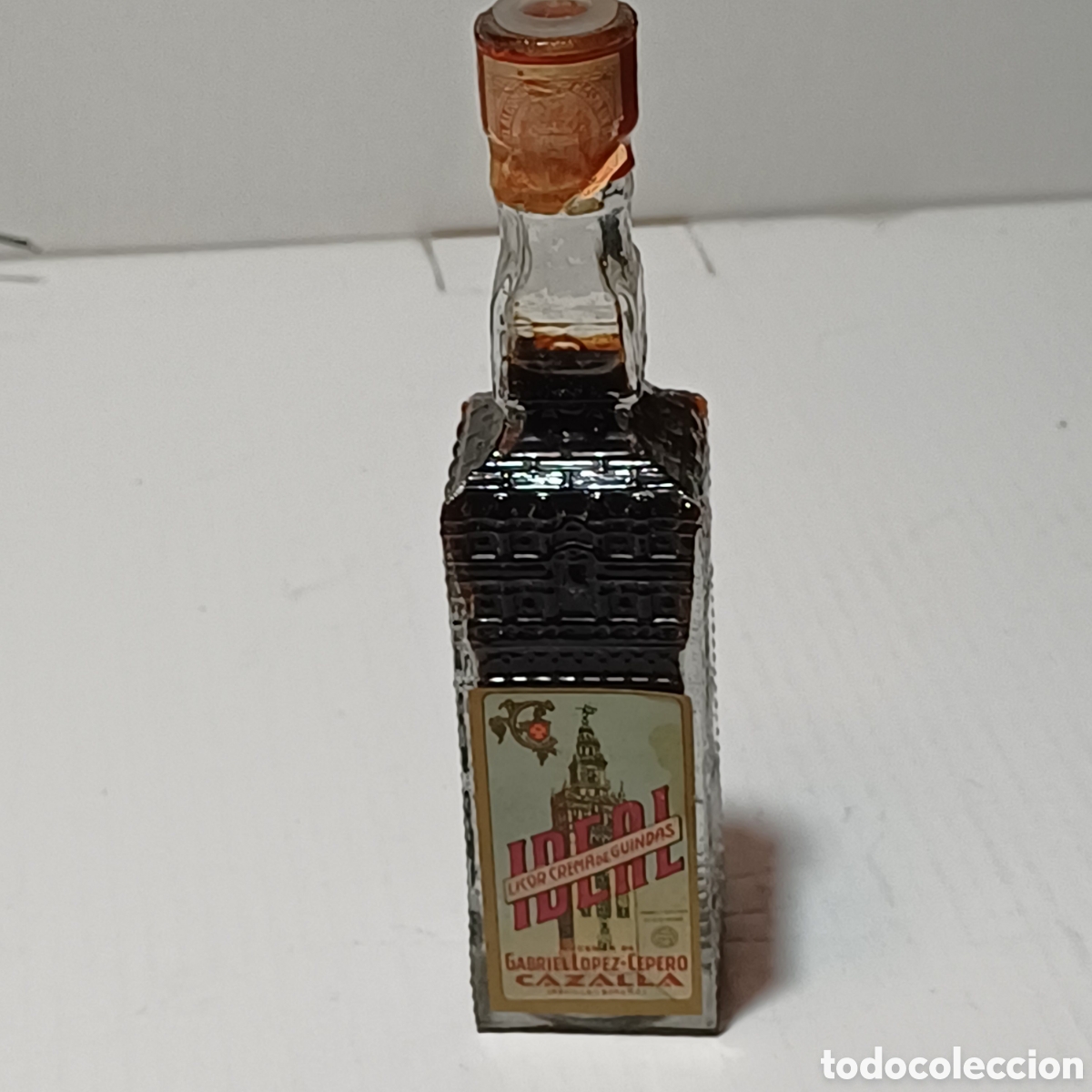 Collection of wines and liquors: Botella mini Miniatura Licor Crema Guindas IDEAL SUCESOR DE GABRIEL LOPEZ CEPERO CAZALLA SEVILLA