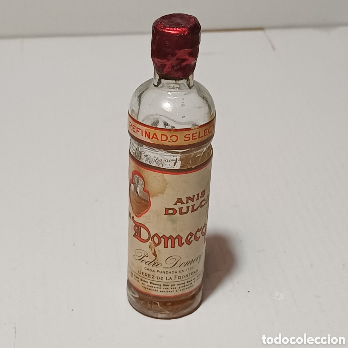Sammlung von Weinen und Lik&ouml;ren: Botella mini Miniatura botellin botellita Anis Dulce Pedro Domecq sello 4 centimos
