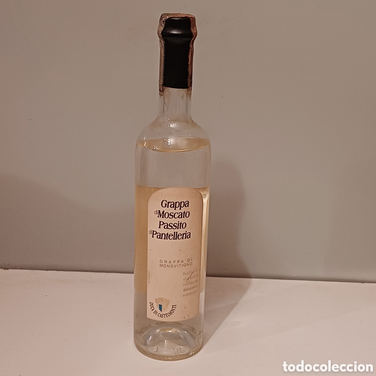 Sammlung von Weinen und Lik&ouml;ren: Botella licor Grappa Moscato Passito di Pantelleria Duca Di Castelmonte Aguardiente italiano 500 ml