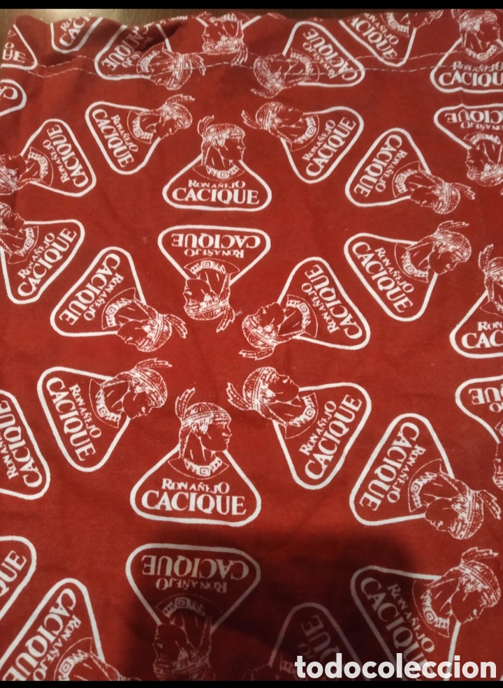 Coleccionismo de vinos y licores: Cuello de la marca Ron Cacique - Foto 2