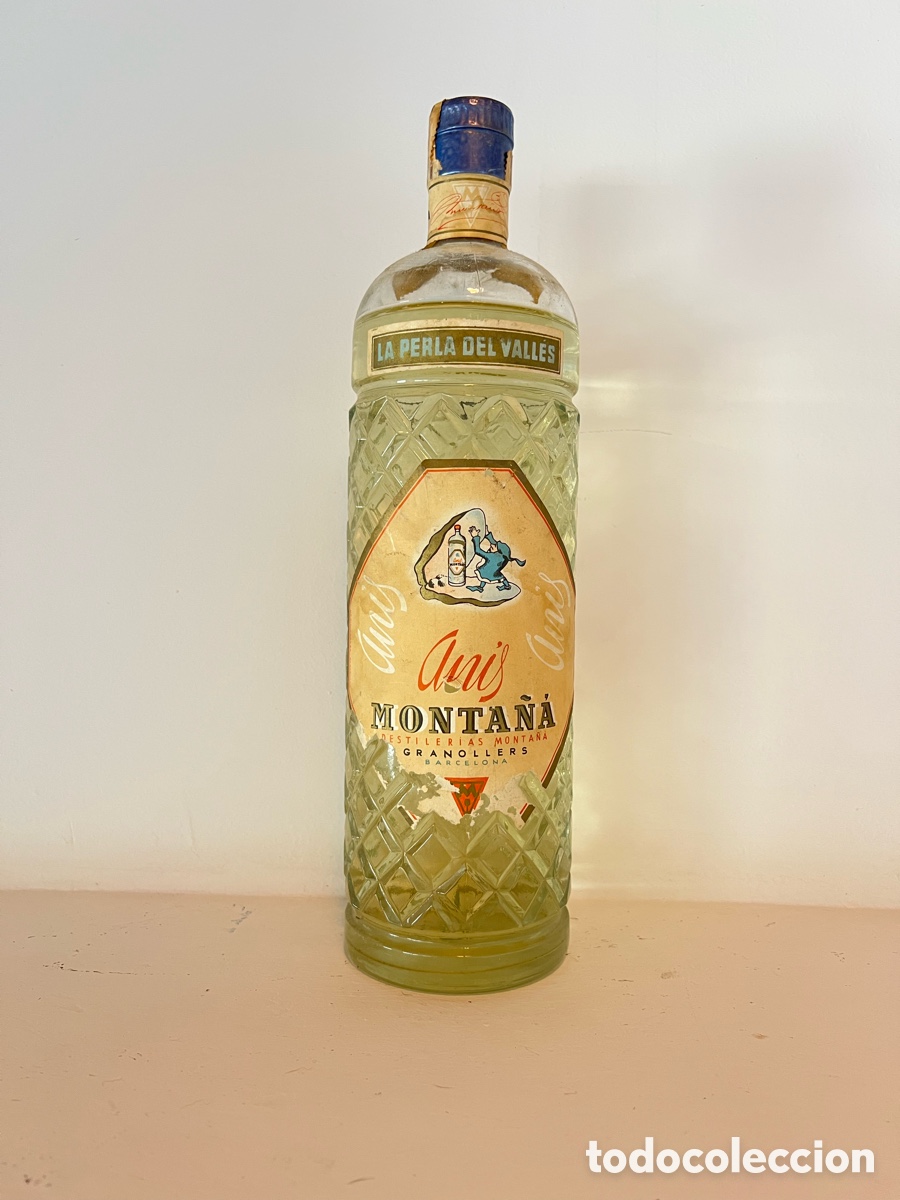 Coleccionismo de vinos y licores: Antigua Botella de ANIS MONTA&Ntilde;A 1Litro DESTILER&Iacute;AS MONTA&Ntilde;A GRANOLLERS