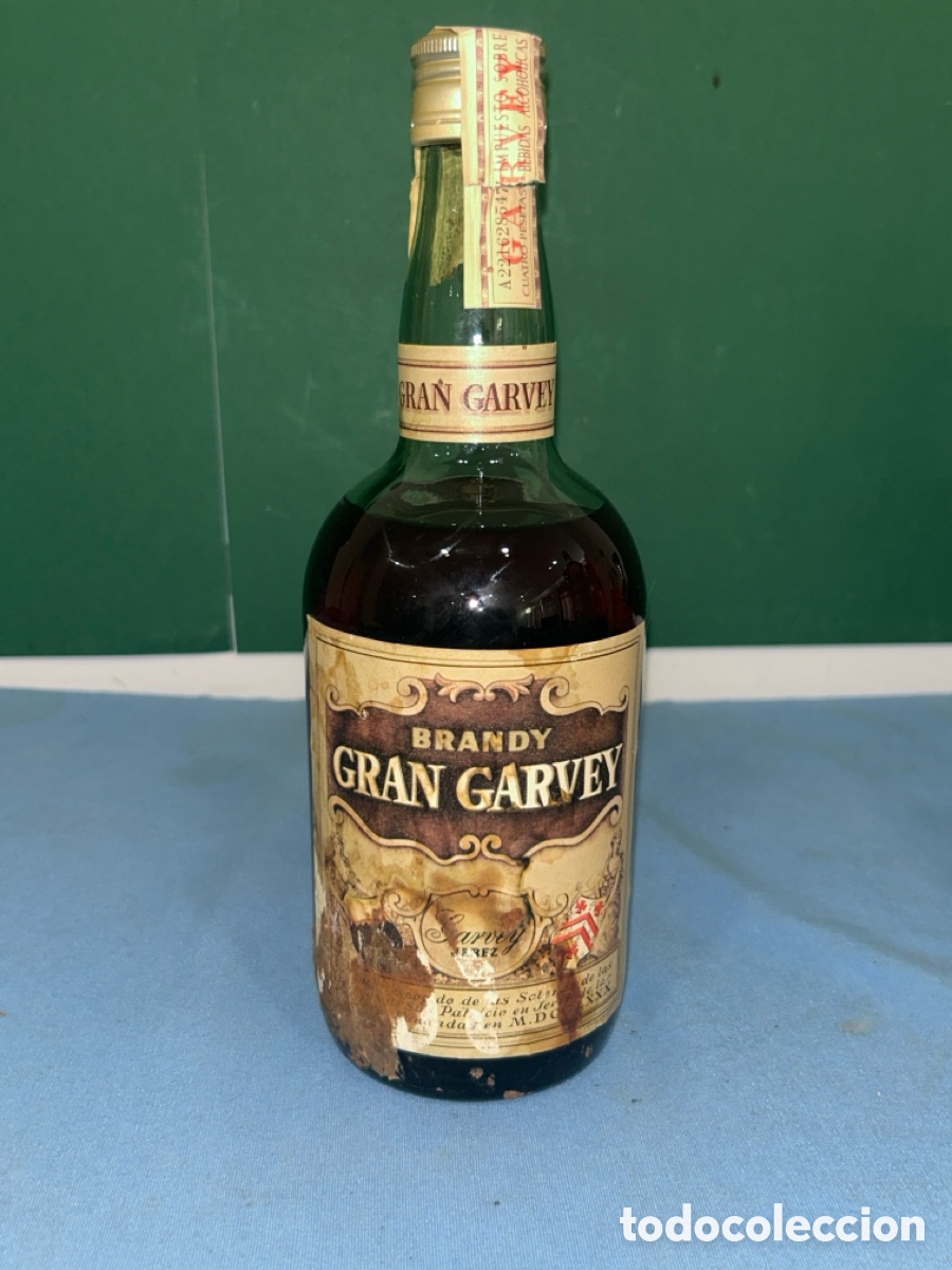 Coleccionismo de vinos y licores: ANTIGUA BOTELLA BRANDY GRAN GARVEY JEREZ *SIN ABRIR* *VER FOTOS*