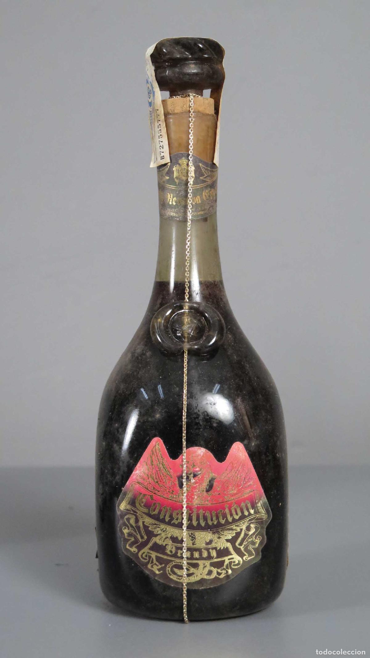 Coleccionismo de vinos y licores: BOTELLA. CONSTITUCION BRANDY - Foto 1