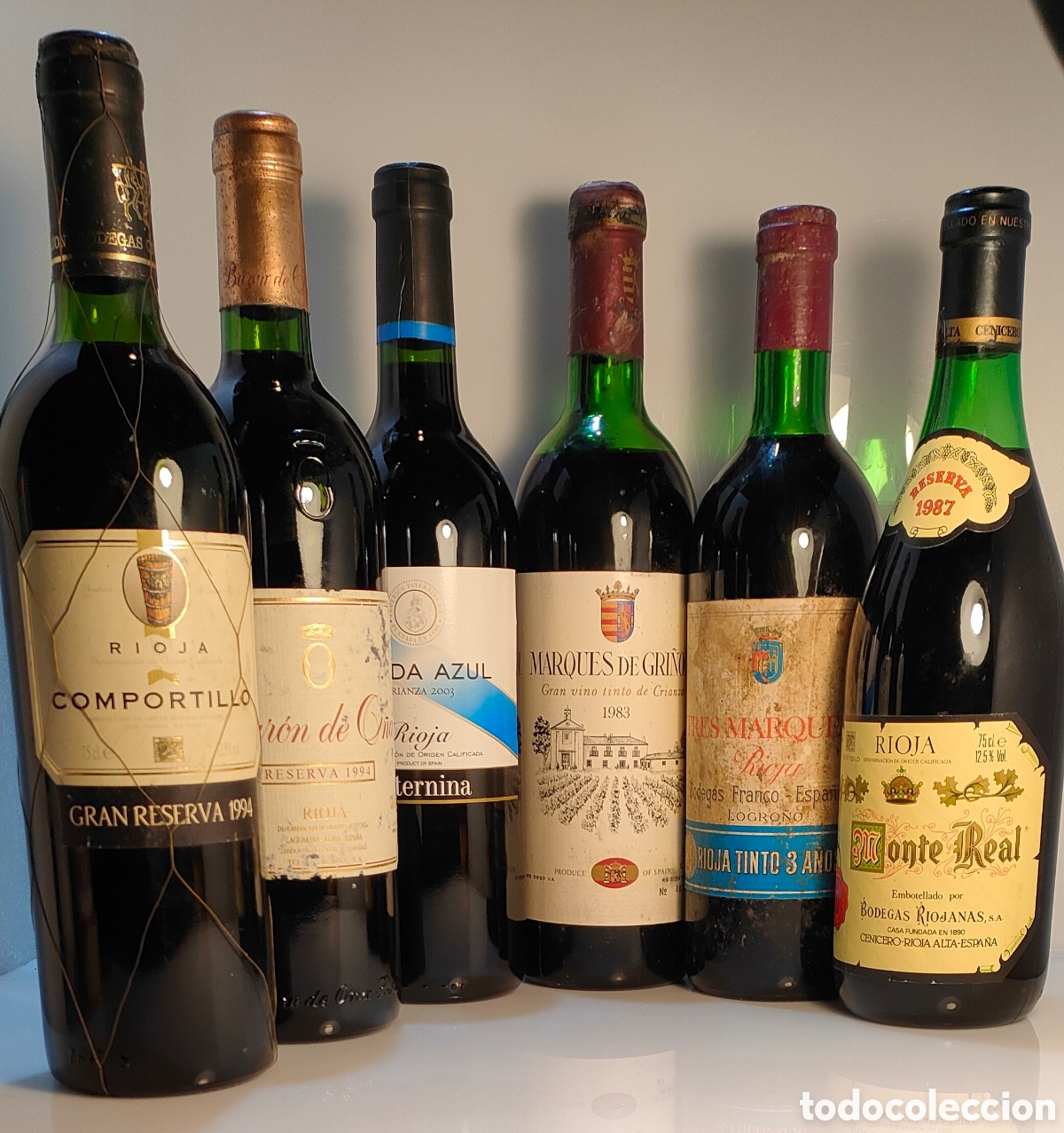 Colecionismo de vinhos e licores: 6 botellas de diferentes a&ntilde;adas