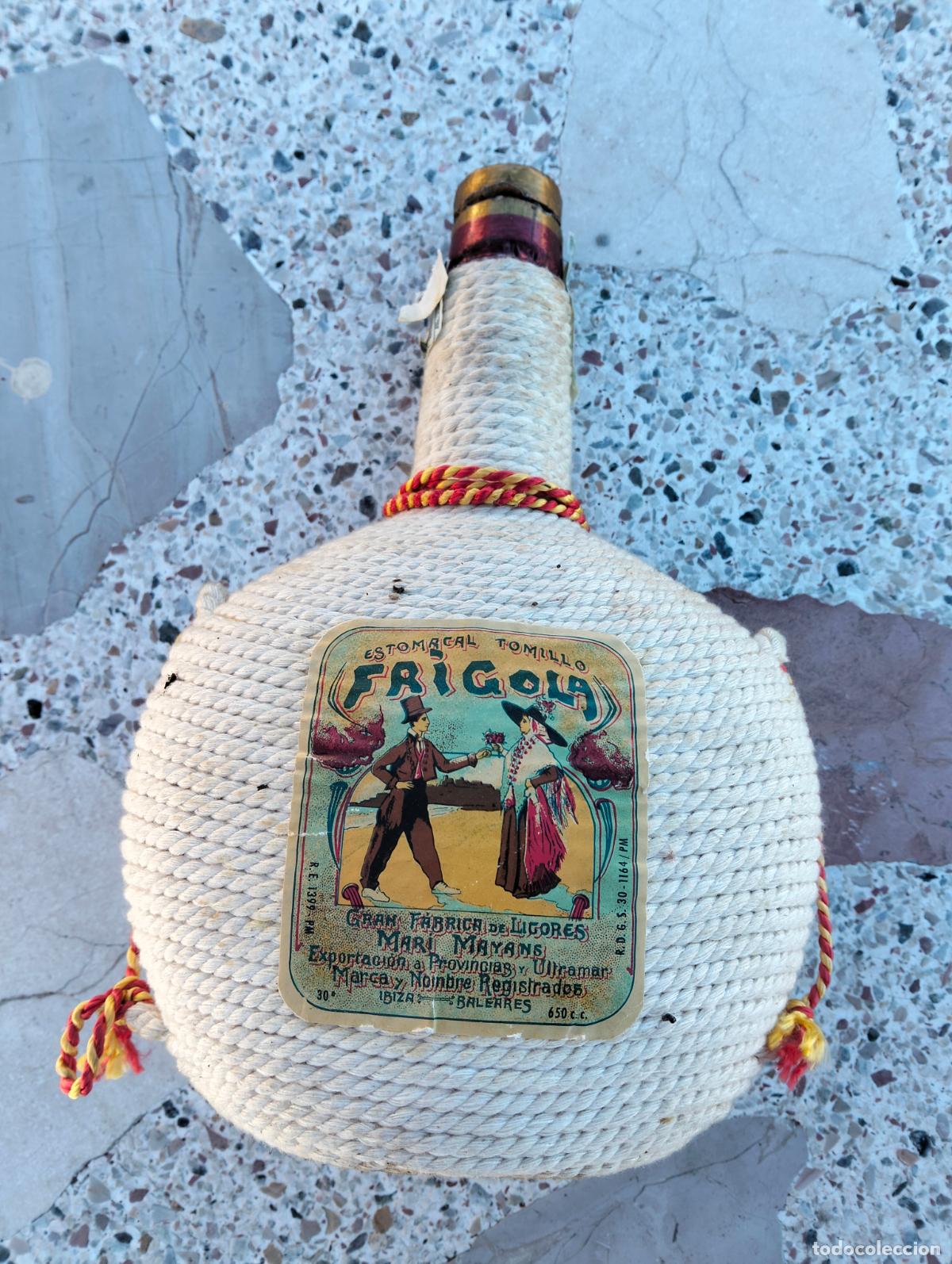 Collectionnisme de vins et liqueurs: Botella vac&iacute;a licor estomacal tomillo Frigola Mari Mayans ibiza baleares