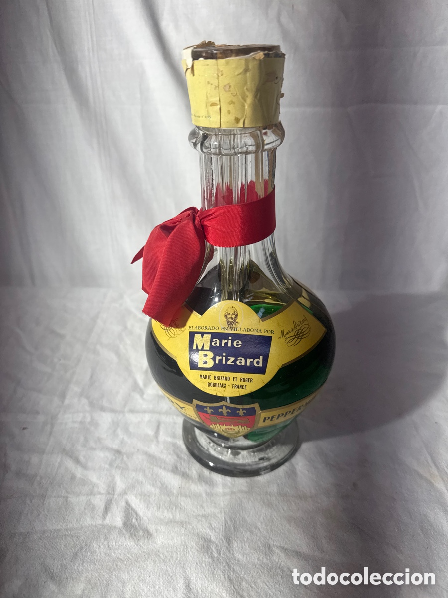 Collectionnisme de vins et liqueurs: Botella de 4 l&iacute;quidos de Marie Brizard precinto 80 ctmos