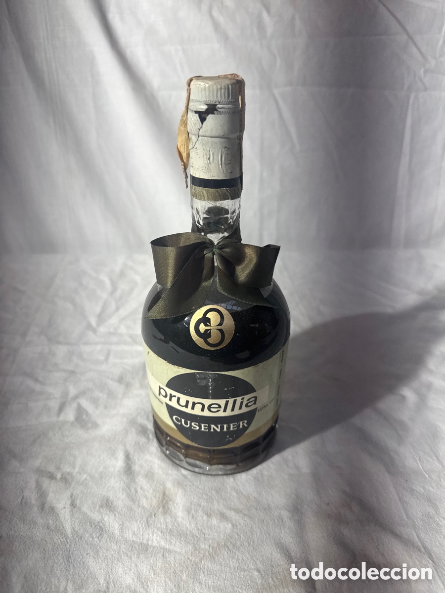 Coleccionismo de vinos y licores: Botella de licor prunellia cusenier precinto 80 ctmos