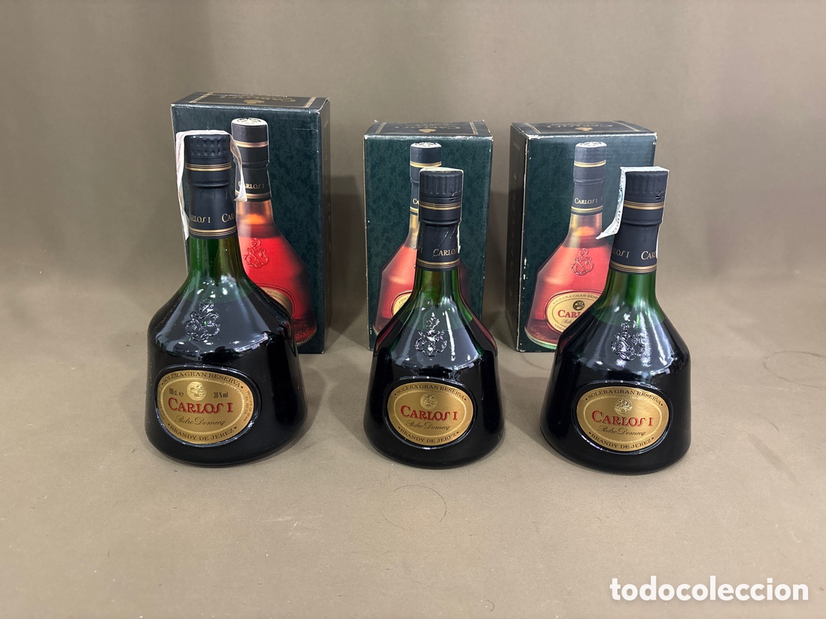 Coleccionismo de vinos y licores: Lote de 3 botellas brandy Carlos I,1 de 1 litro y 2 de 70cl*ver fotos*sin abrir*,en su caja