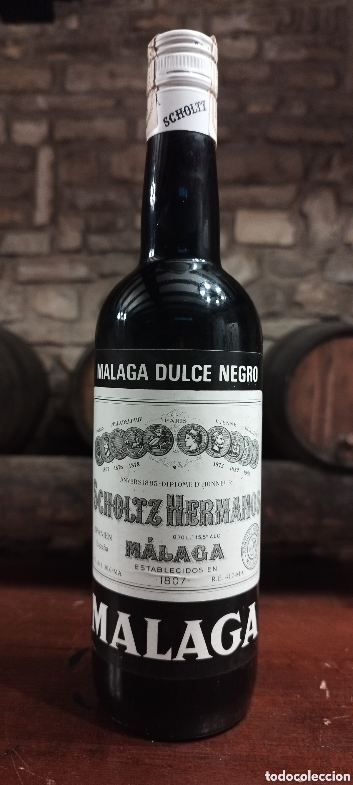 Coleccionismo de vinos y licores: Antigua Botella M&Aacute;LAGA DULCE NEGRO - Scholtz Hermanos - 0,70 L - Precintada