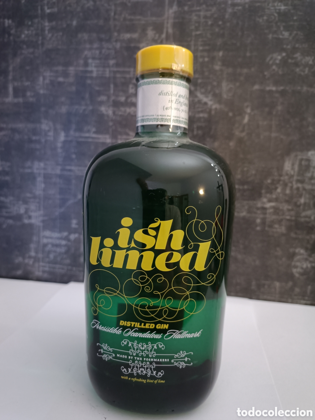 Collection of wines and liquors: BOTELLA DE GINEBRA AL LIM&Oacute;N, INGLATERRA LONDRES.