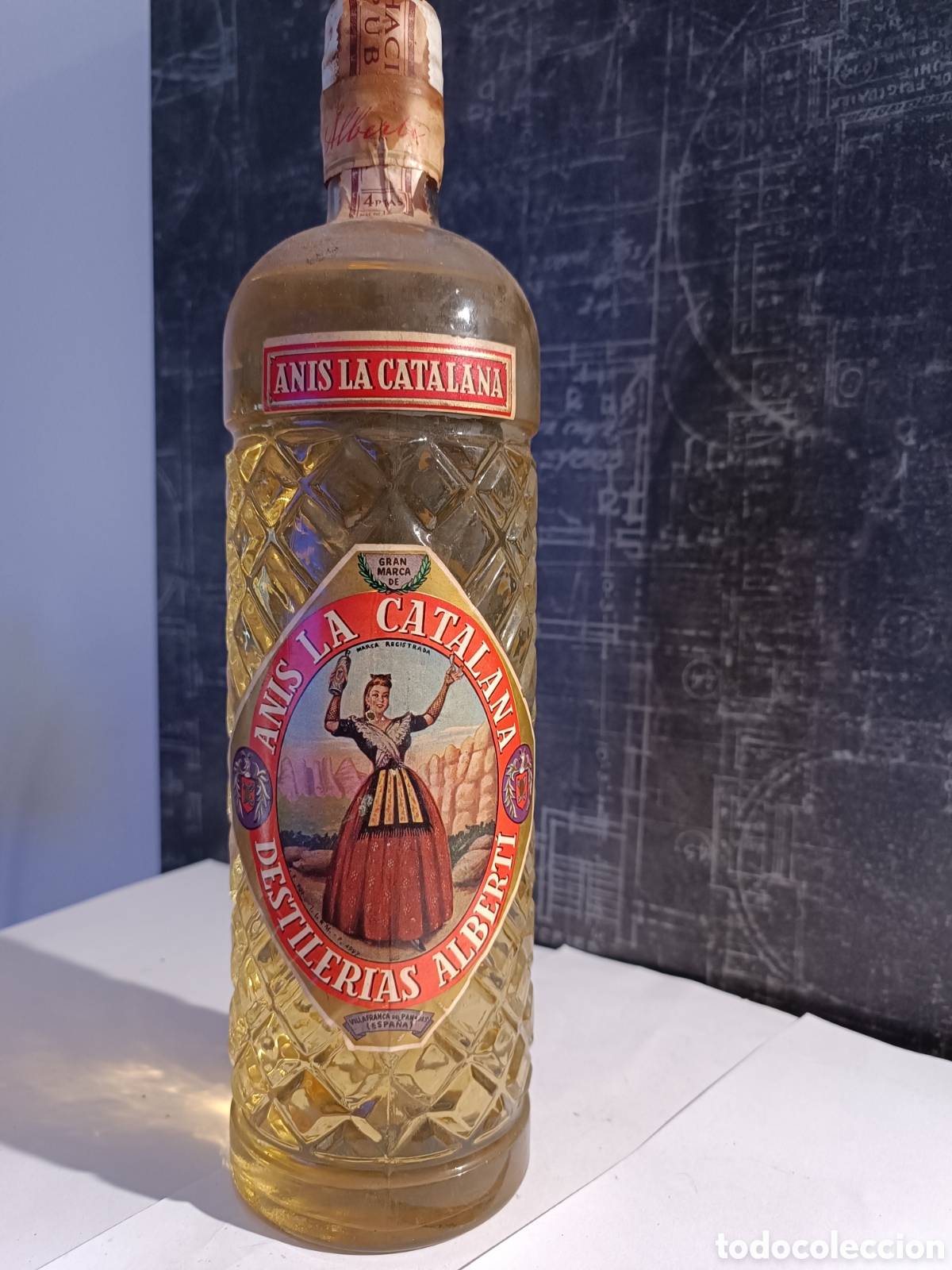 Coleccionismo de vinos y licores: ANTIGUA BOTELLA DE LICOR DE AN&Iacute;S &rdquo;AN&Iacute;S LA CATALANA&rdquo;.