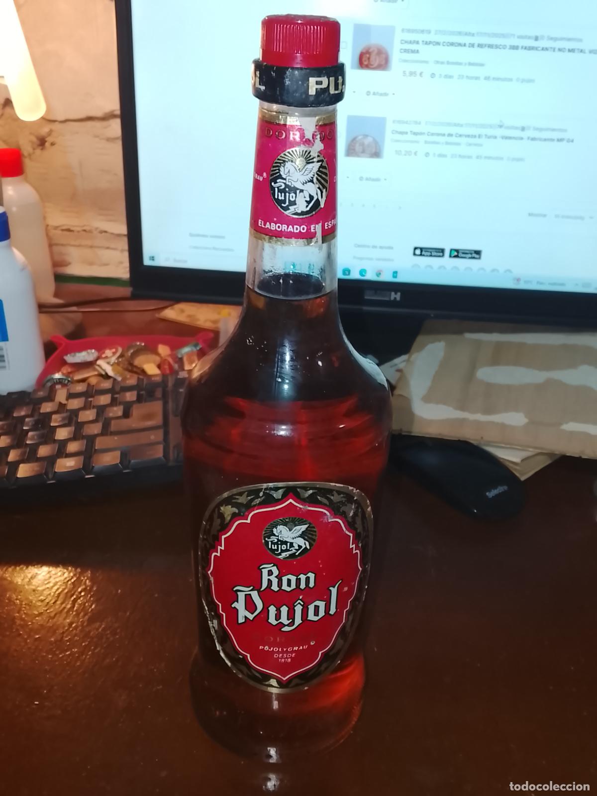 Coleccionismo de vinos y licores: Botella de Ron Pujol-Dorado- de Pujol y Grau- Sin Precinto-1 litro