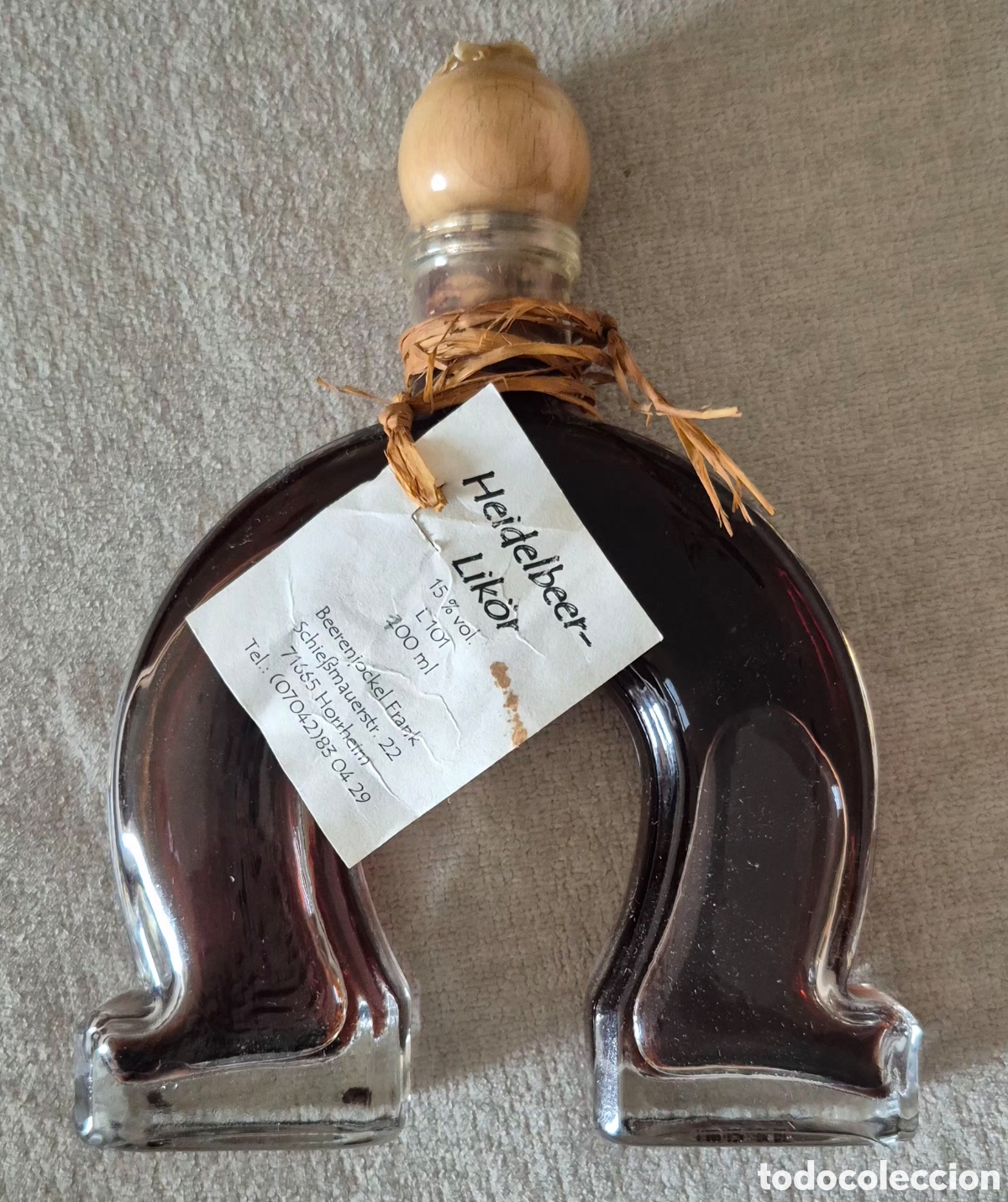 Coleccionismo de vinos y licores: Rara y original botella de Licor alem&aacute;n de ar&aacute;ndanos artesanal 100 ml botella decorativa (sin abrir)