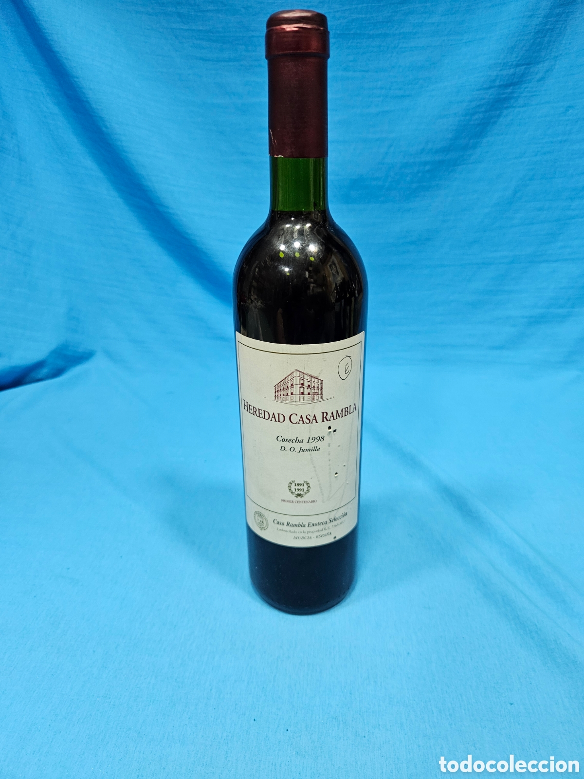 Collection of wines and liquors: BOTELLA VINO TINTO. HEREDAD CASA RAMBLA. COSECHA 1998. JUMILLA