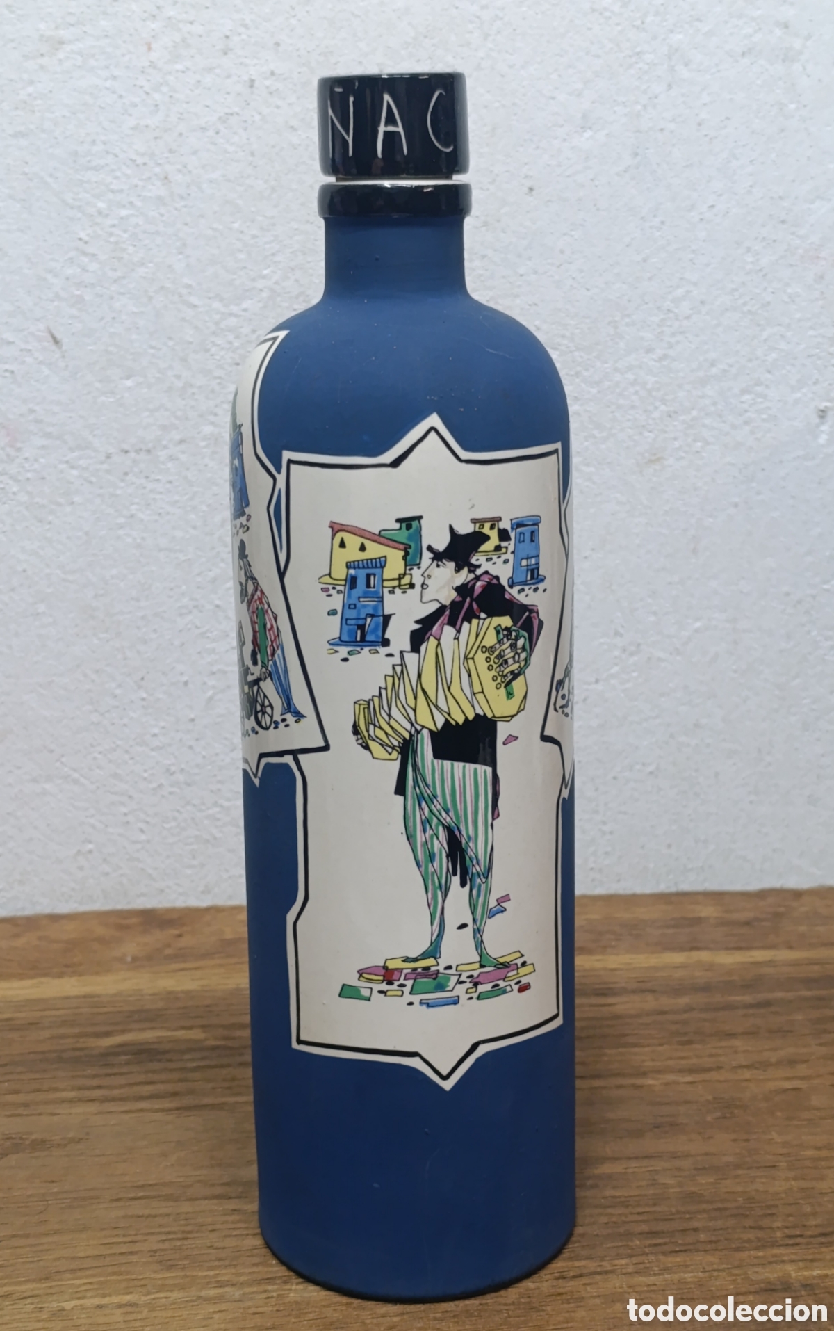 Coleccionismo de vinos y licores: MUY BONITA BOTELLA DE CO&Ntilde;AC DE CER&Aacute;MICA SUREDA