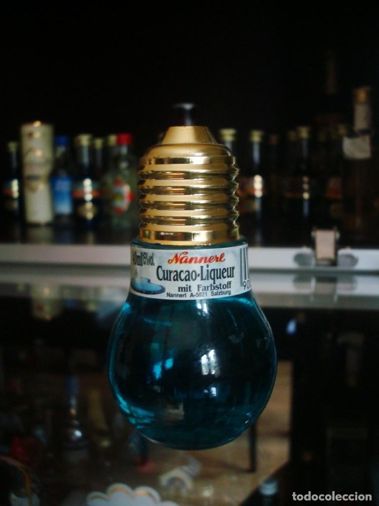 Coleccionismo de vinos y licores: Curacao liqueur Nanneremit Farbstoff Licor de Cura&ccedil;ao (botell&iacute;n bombilla) Por abrir