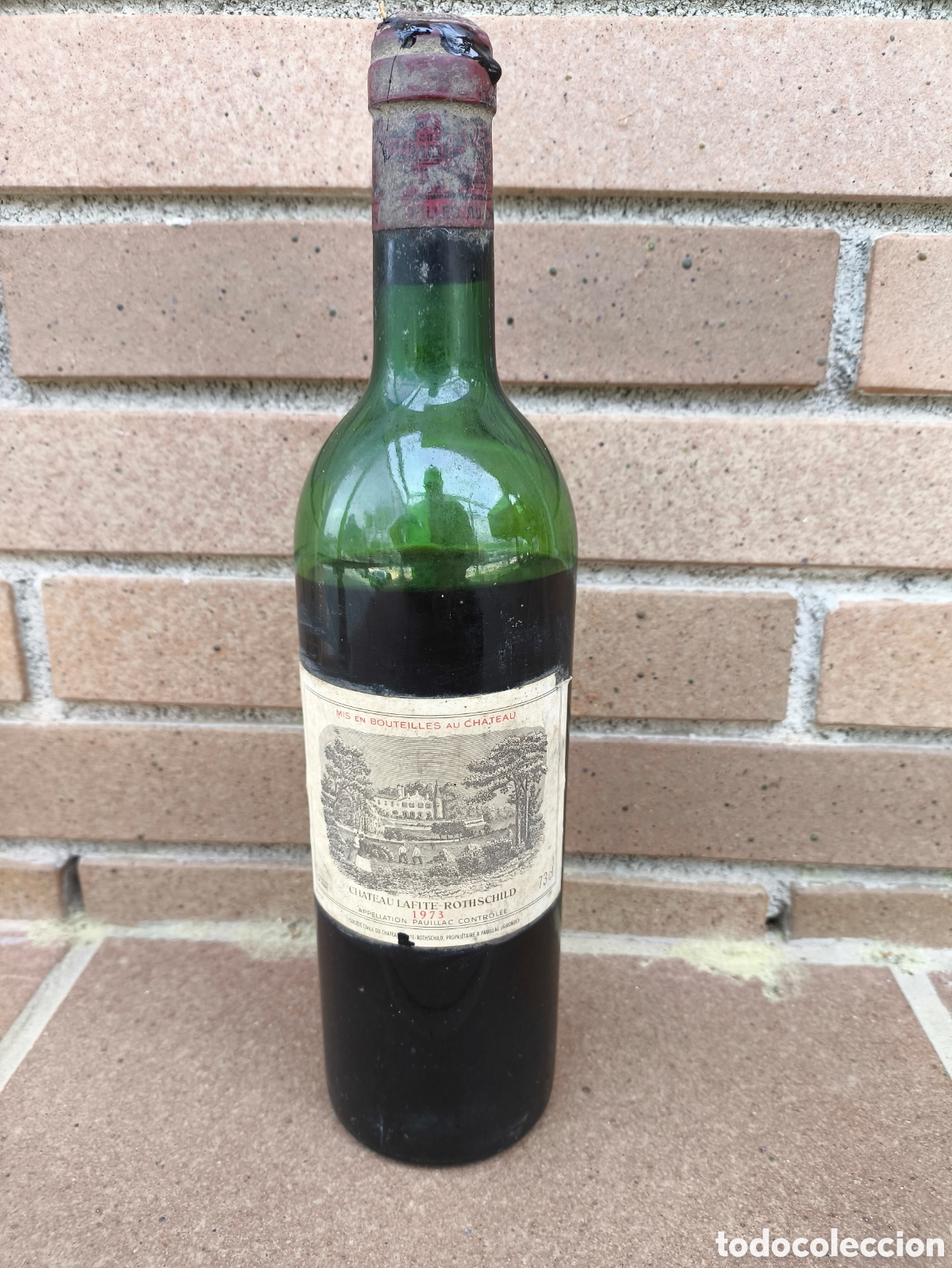 Coleccionismo de vinos y licores: Botella vino Chateau Lafite Rothschild 1973 con fugas