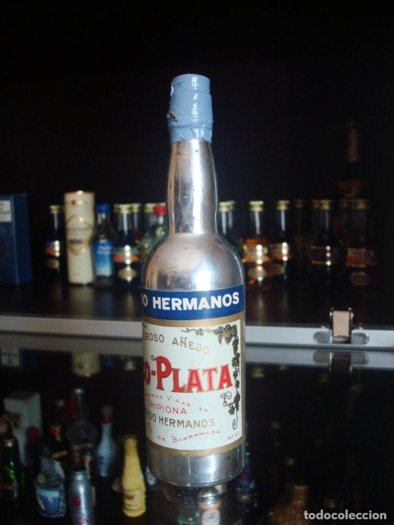 Coleccionismo de vinos y licores: Pico-plata Florido Hermanos Generoso A&ntilde;ejo Chipiona (botell&iacute;n 17 cm) por abrir