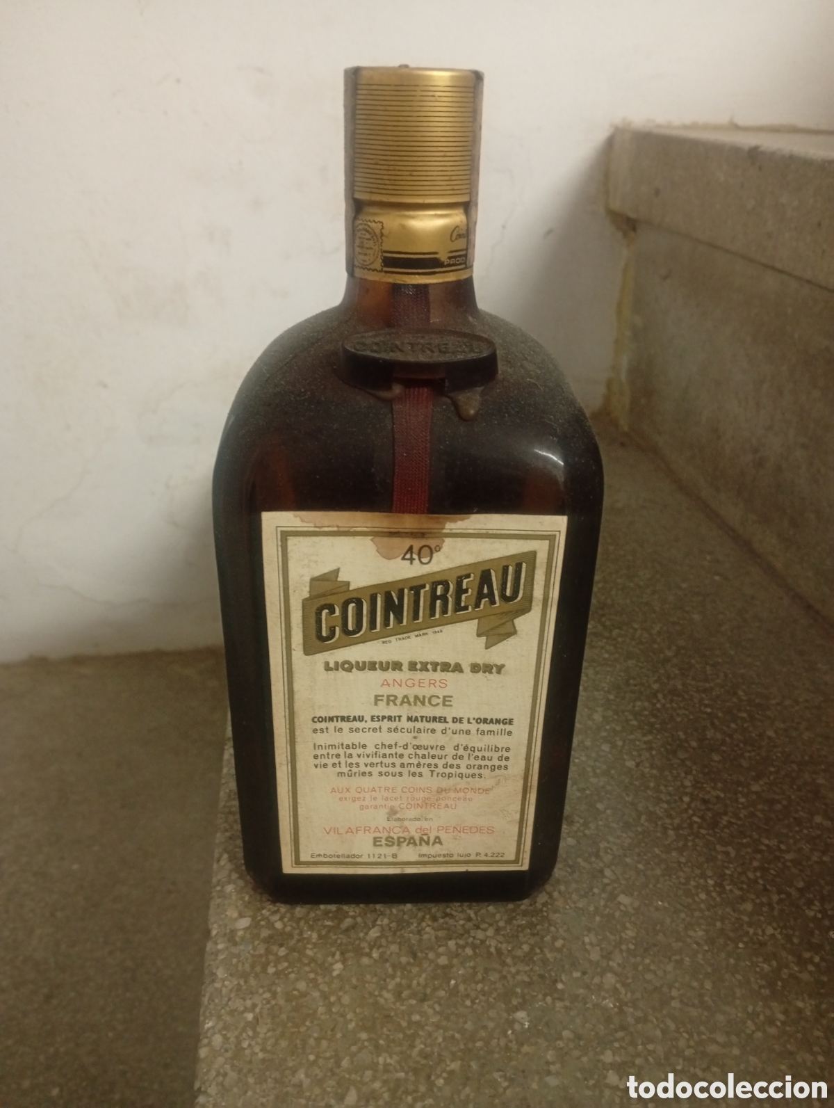 Sammlung von Weinen und Lik&ouml;ren: botella Cointreau, a&ntilde;os 70, sin abrir