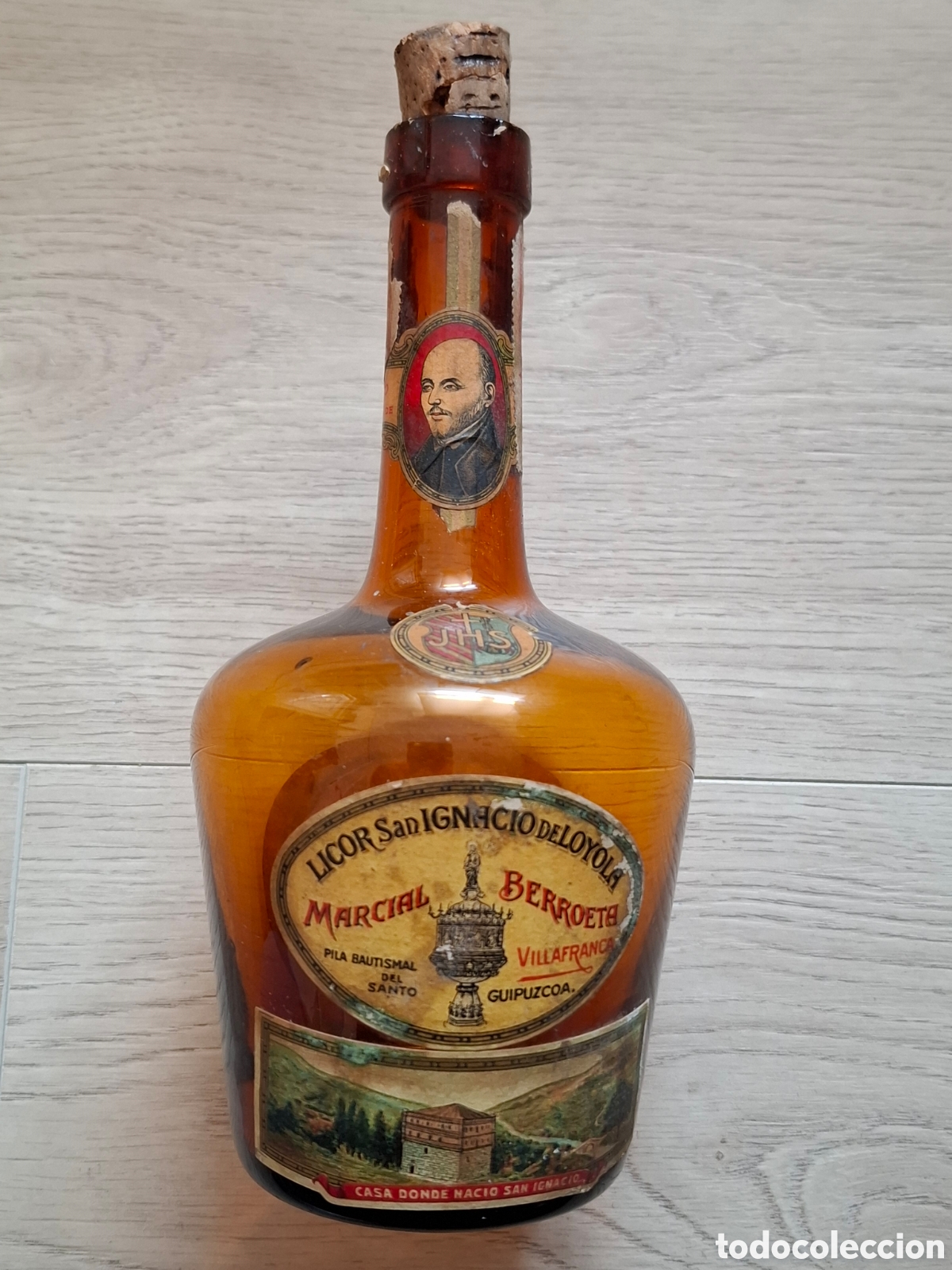 Coleccionismo de vinos y licores: Botella Licor San Ignacio de Loyola, Marcial Berroeta, Villafranca Guip&uacute;zcoa, muy decorada y rara