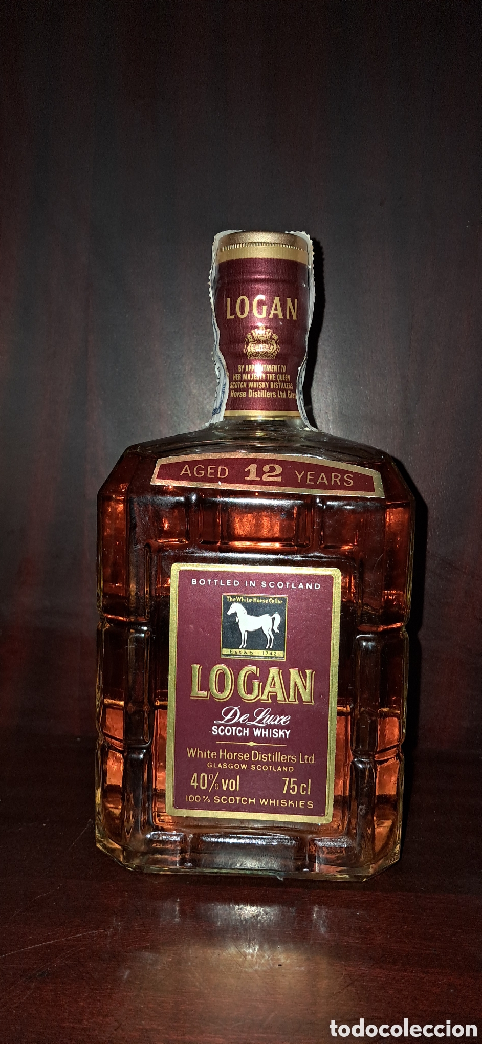 Coleccionismo de vinos y licores: Whisky Escoc&eacute;s Logan De Luxe 12 A&ntilde;os &ndash; 75cl &ndash; Con Caja Original y Sello de Hacienda a&ntilde;os 80 - 90