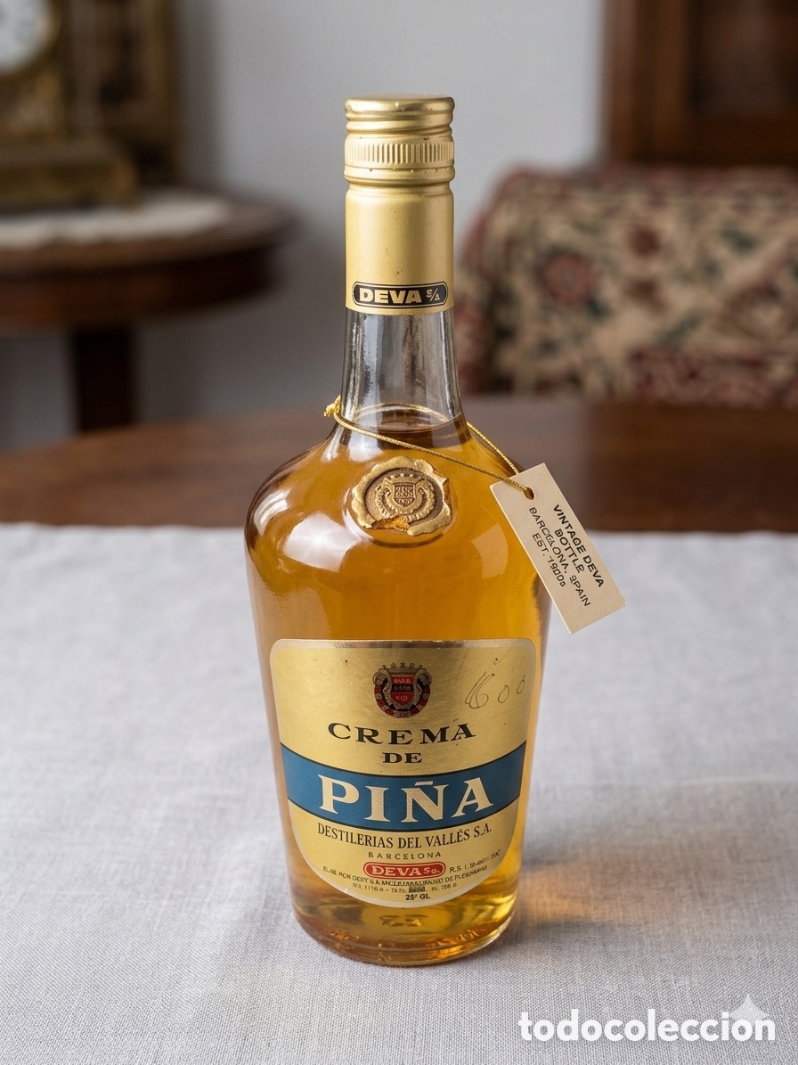 Coleccionismo de vinos y licores: Antigua Botella Crema de Pi&ntilde;a DEVA - Destiler&iacute;as del Vall&eacute;s (Barcelona) - Sin abrir - A&ntilde;os 70/80