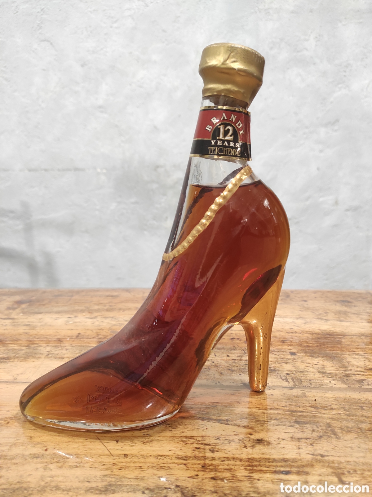 Coleccionismo de vinos y licores: Brandy Teichenn&eacute; 12 years. Zapato.