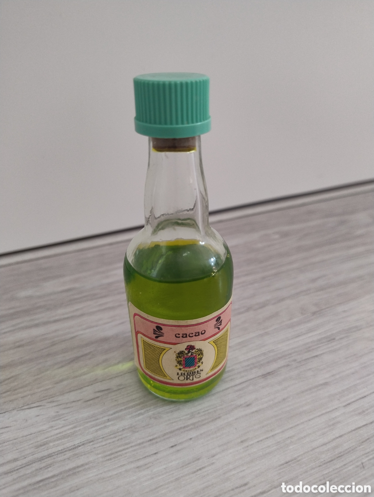 Coleccionismo de vinos y licores: M69 Miniatura botell&iacute;n licor de cacao Orte. A&ntilde;os 60-70. Precintada. Perfecto estado.