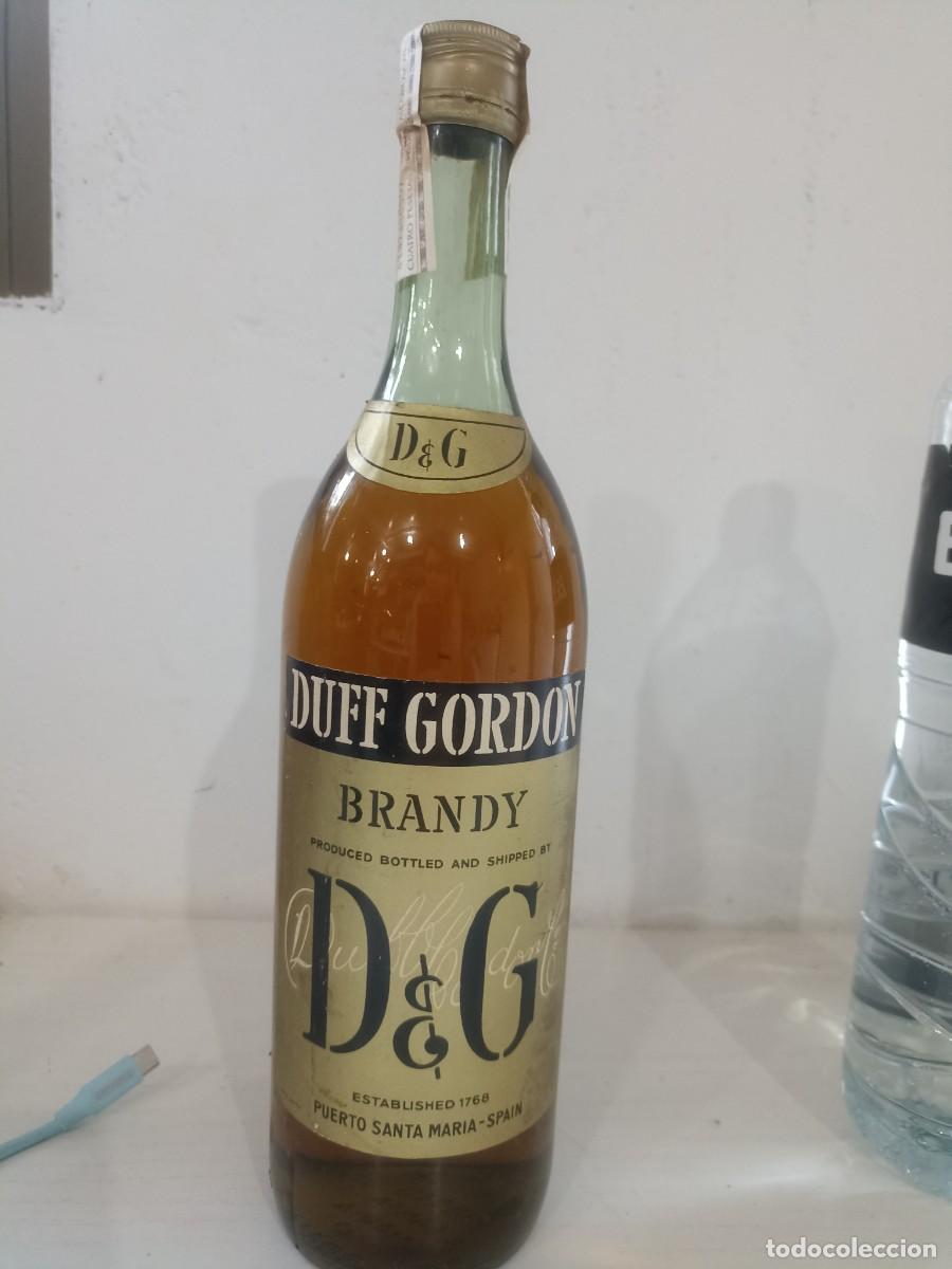 Coleccionismo de vinos y licores: Botella brandy Duff Gordon sello 4 pesetas