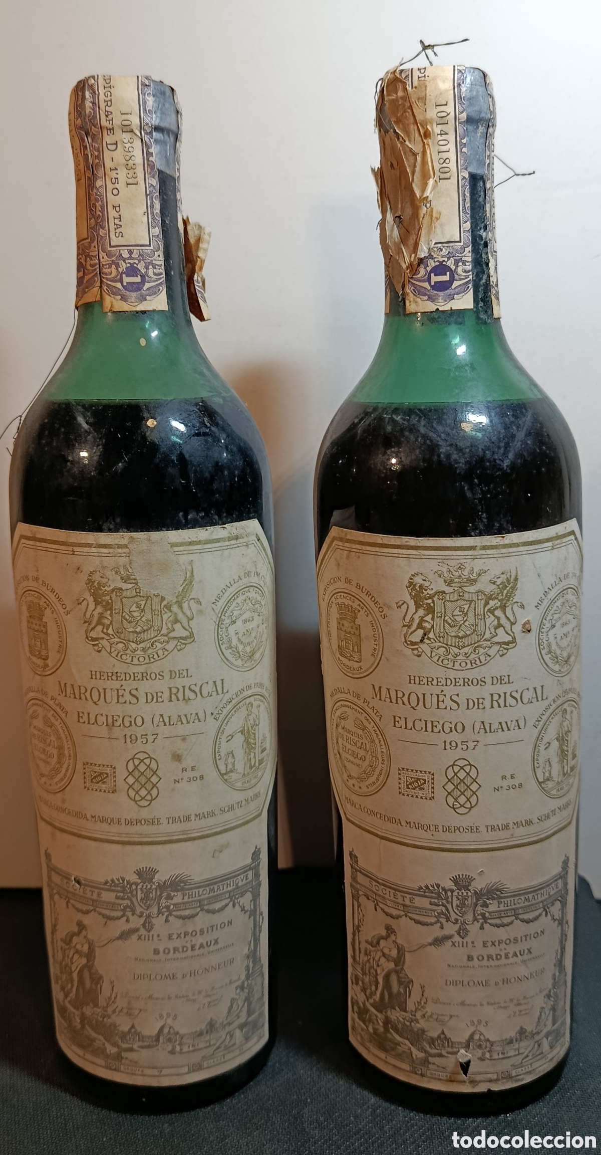 Coleccionismo de vinos y licores: 2 Botellas Marqu&eacute;s de Riscal 1957 sin abrir con sus precintos