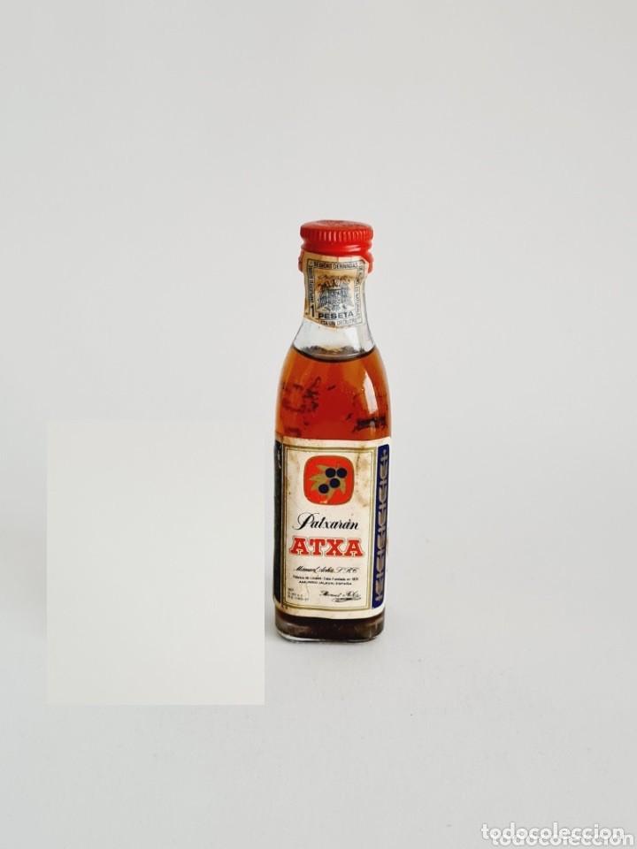 Sammlung von Weinen und Lik&ouml;ren: BOTELLITA PATXARAN ATXA 11.2CM VIDRIO BOTELLIN