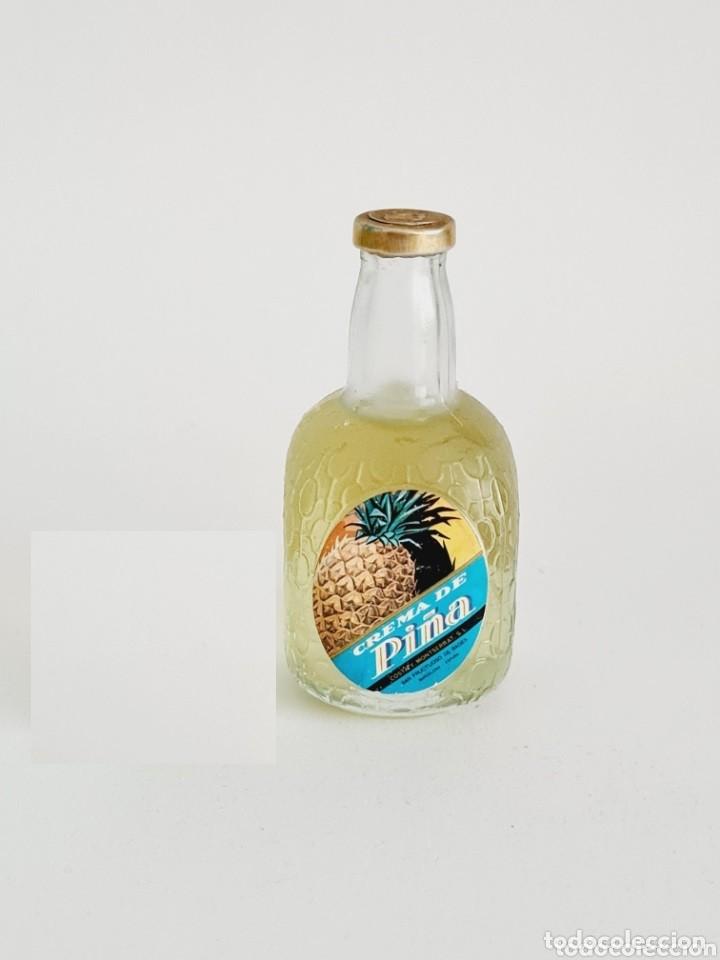 Collectionnisme de vins et liqueurs: BOTELLITA CREMA DE PI&Ntilde;A 8.8CM VIDRIO BOTELLIN