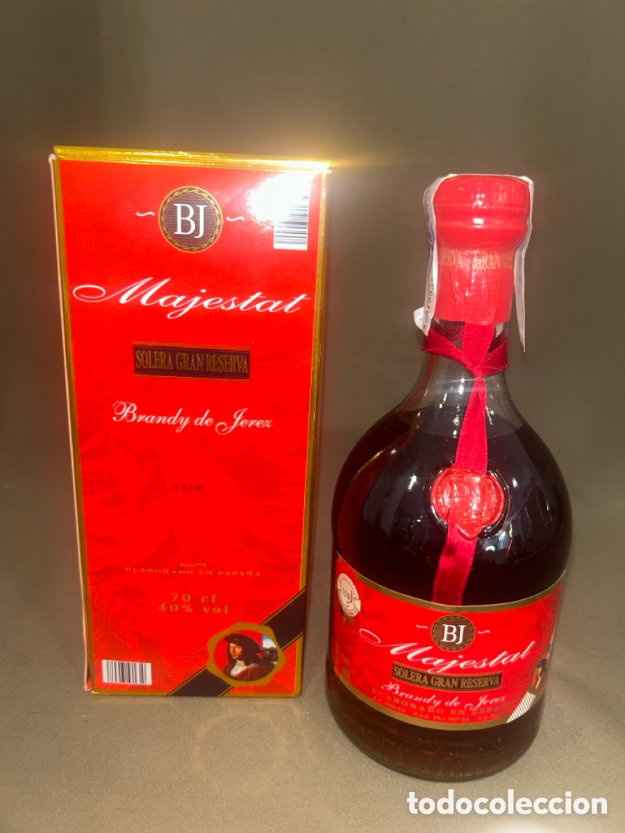 Coleccionismo de vinos y licores: BOTELLA DE BRANDY MAJESTAT SOLERA GRAN RESERVA BRANDY DE JEREZ *LLENA, PRECINTADA Y SIN ABRIR*