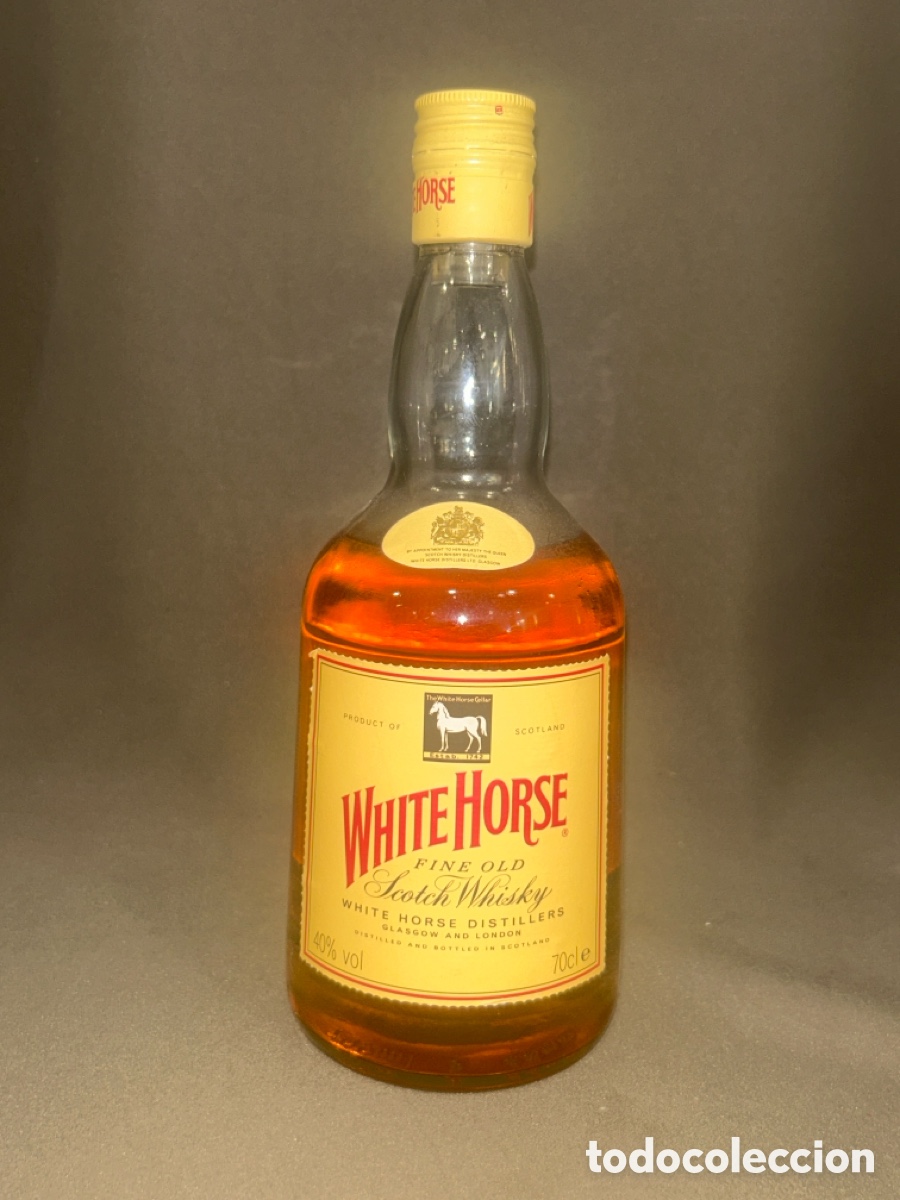 Coleccionismo de vinos y licores: BOTELLA WHITE HORSE, FINE OLD SCOTCH WHISKY, WHISKY ESCOC&Eacute;S 70 CL *LLENA, PRECINTADA Y SIN ABRIR*