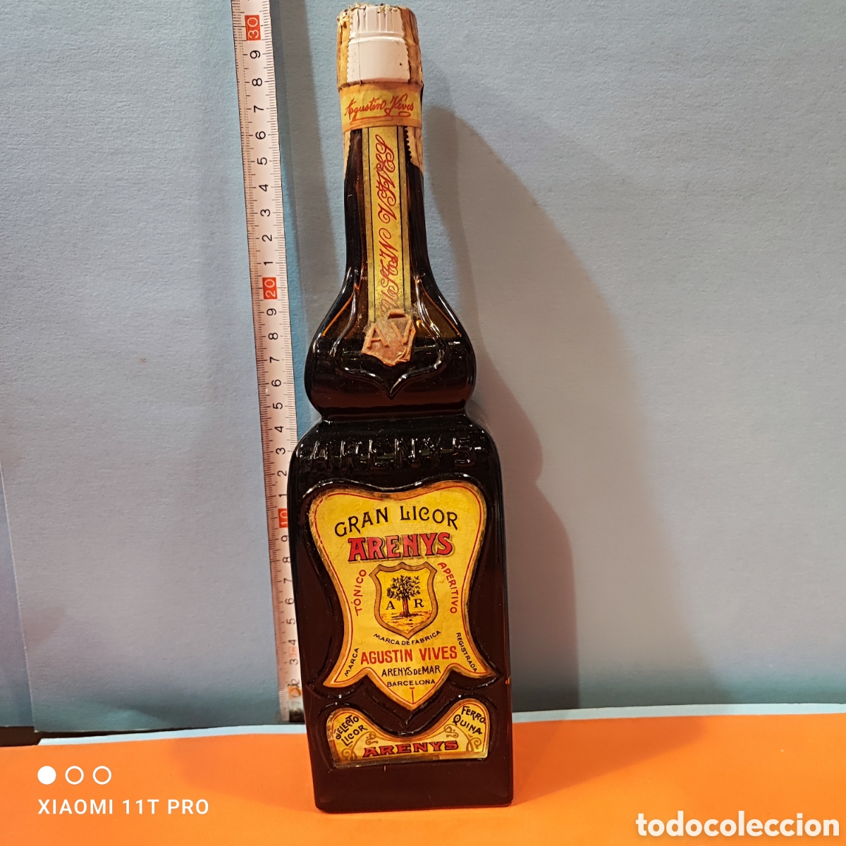 Coleccionismo de vinos y licores: Botella de licor Arenys elaborado por destiler&iacute;as Agust&iacute;n vives.