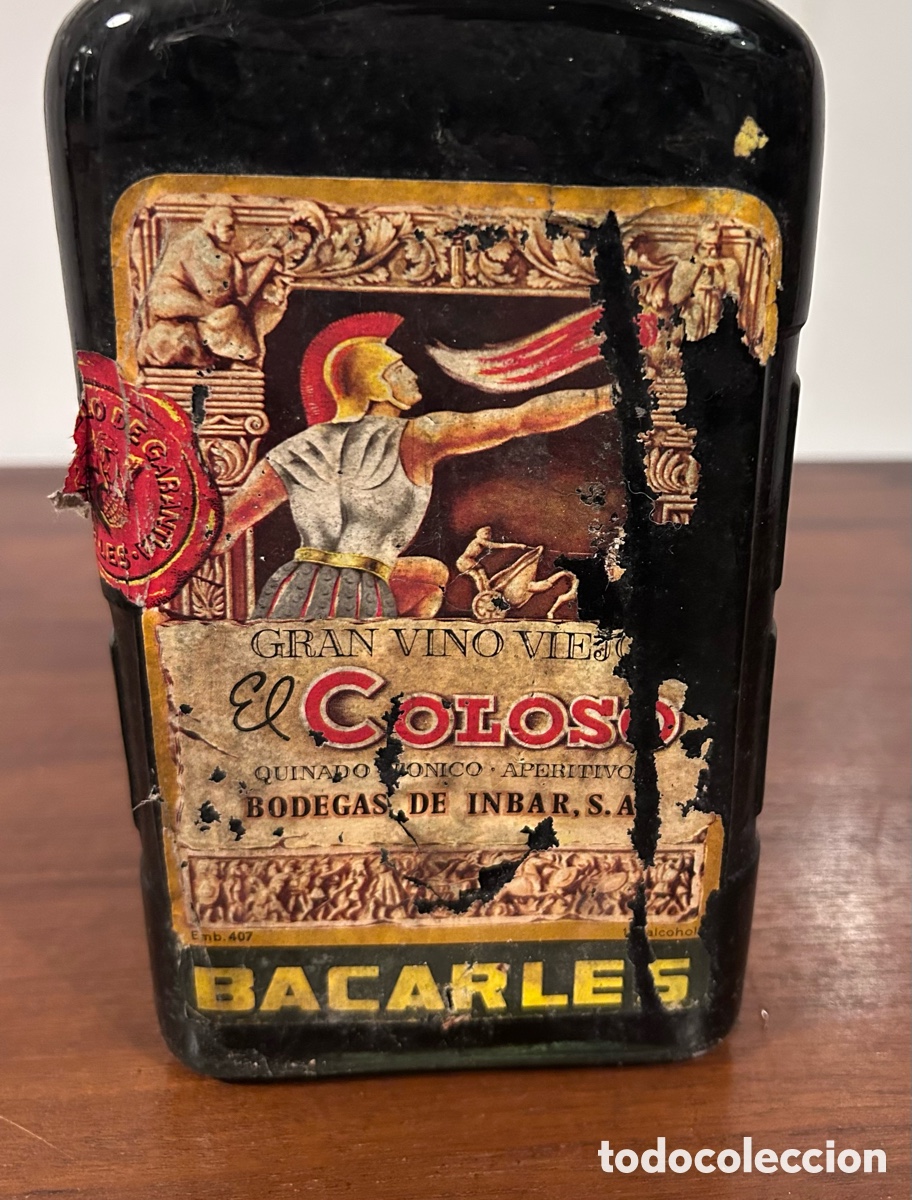 Coleccionismo de vinos y licores: GRAN VINO VIEJO EL COLOSO. BACARLES. BOTELLA LLENA Y PRECINTADA