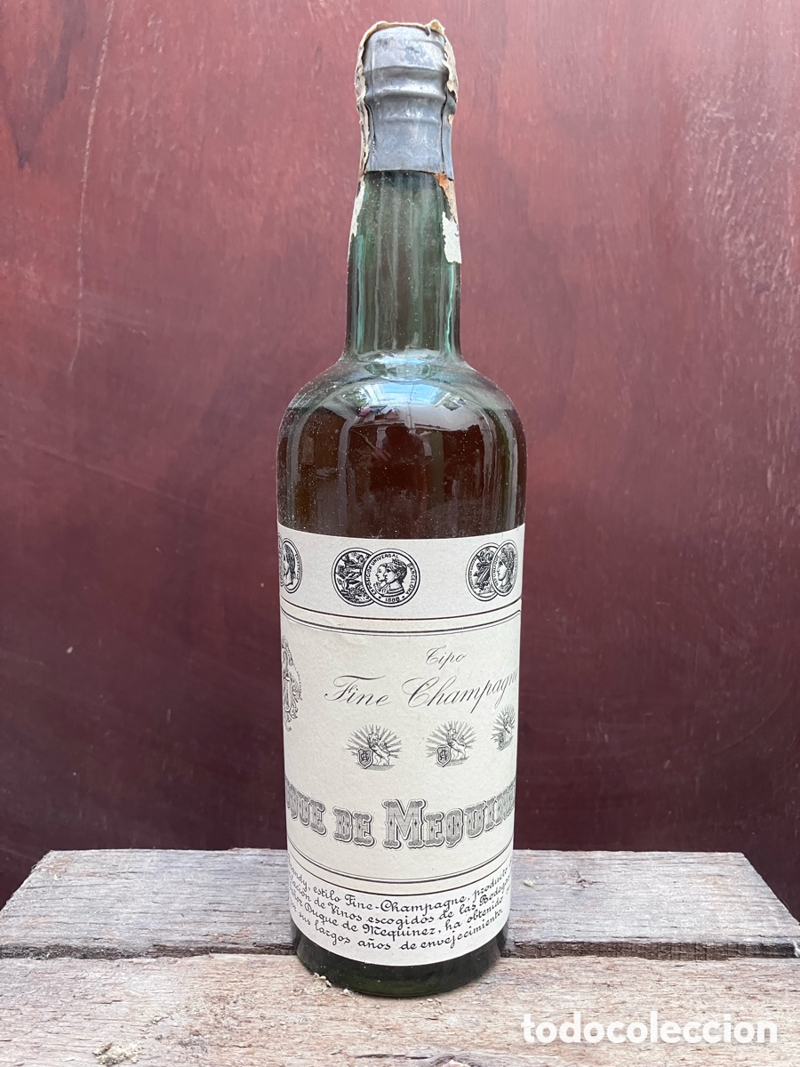 Coleccionismo de vinos y licores: Antigua botella tipo fine champagne, duque de Mequinez.