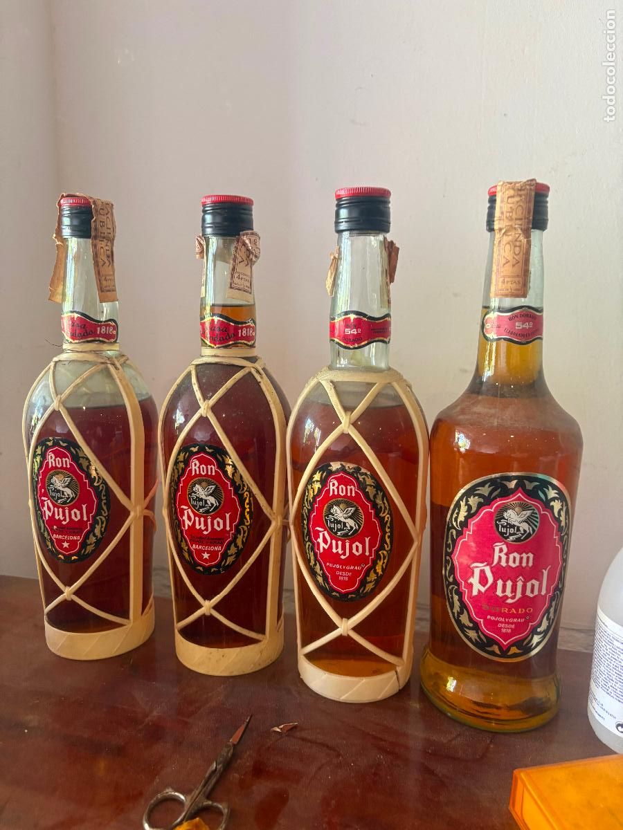 Coleccionismo de vinos y licores: Ron rhum pujol leer gastos envio
