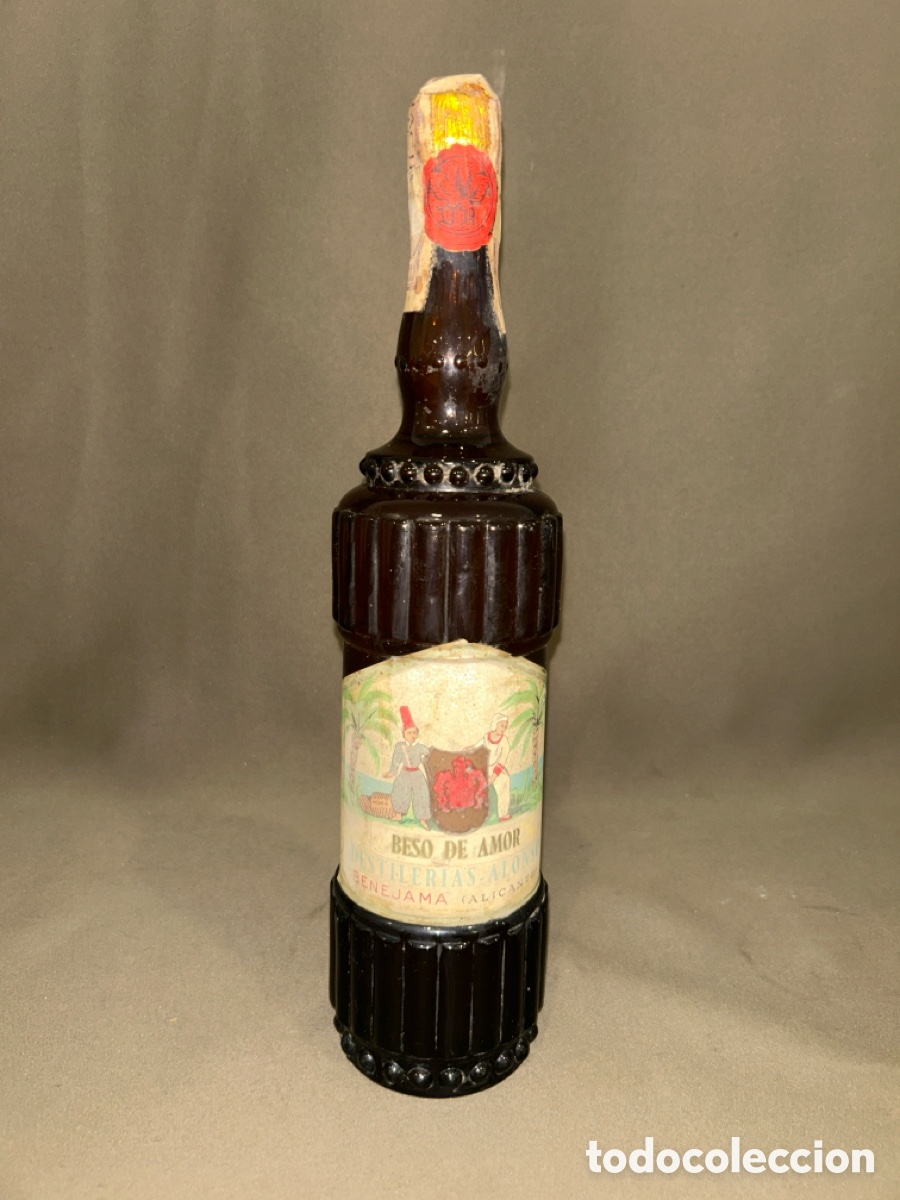Coleccionismo de vinos y licores: ANTIGUA BOTELLA DE LICOR BESO DE AMOR DESTILER&Iacute;AS ALONSO BENEJAMA (ALICANTE) IMP 4 PTAS *SIN ABRIR*