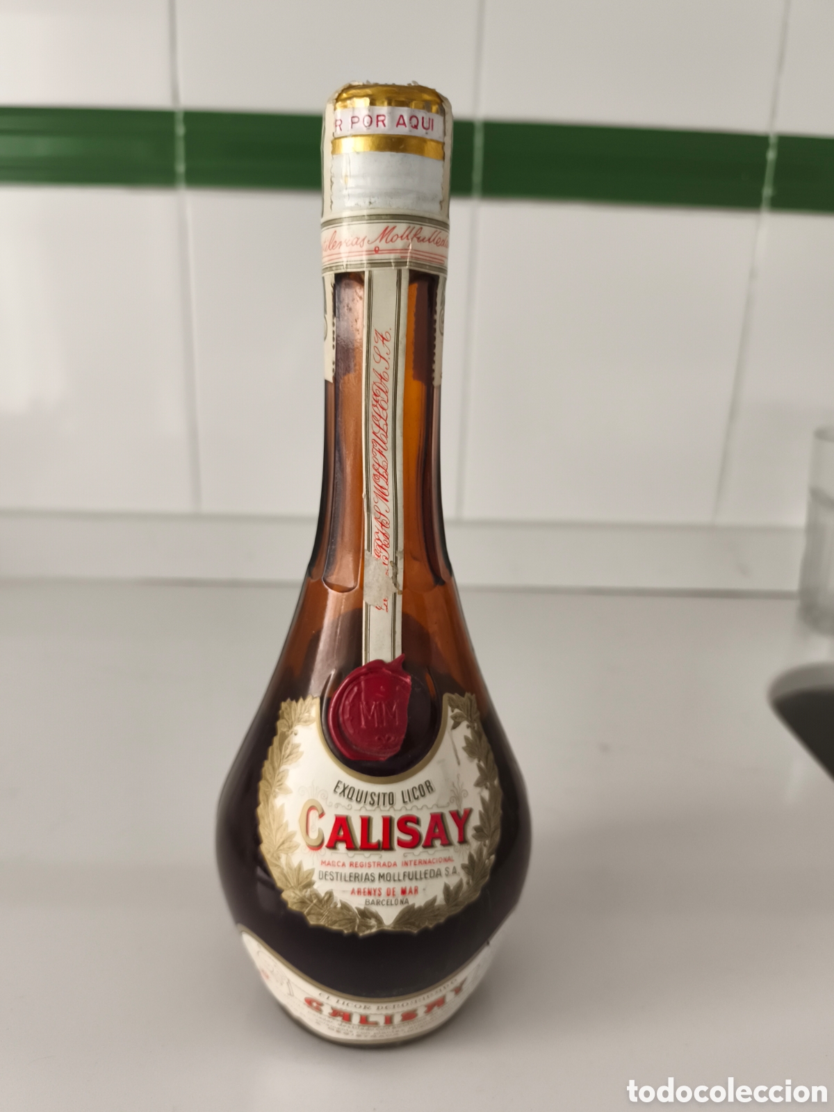 Coleccionismo de vinos y licores: Antigua botella de Licor Calisay 1/2 litro precinta cuarenta c&eacute;ntimos