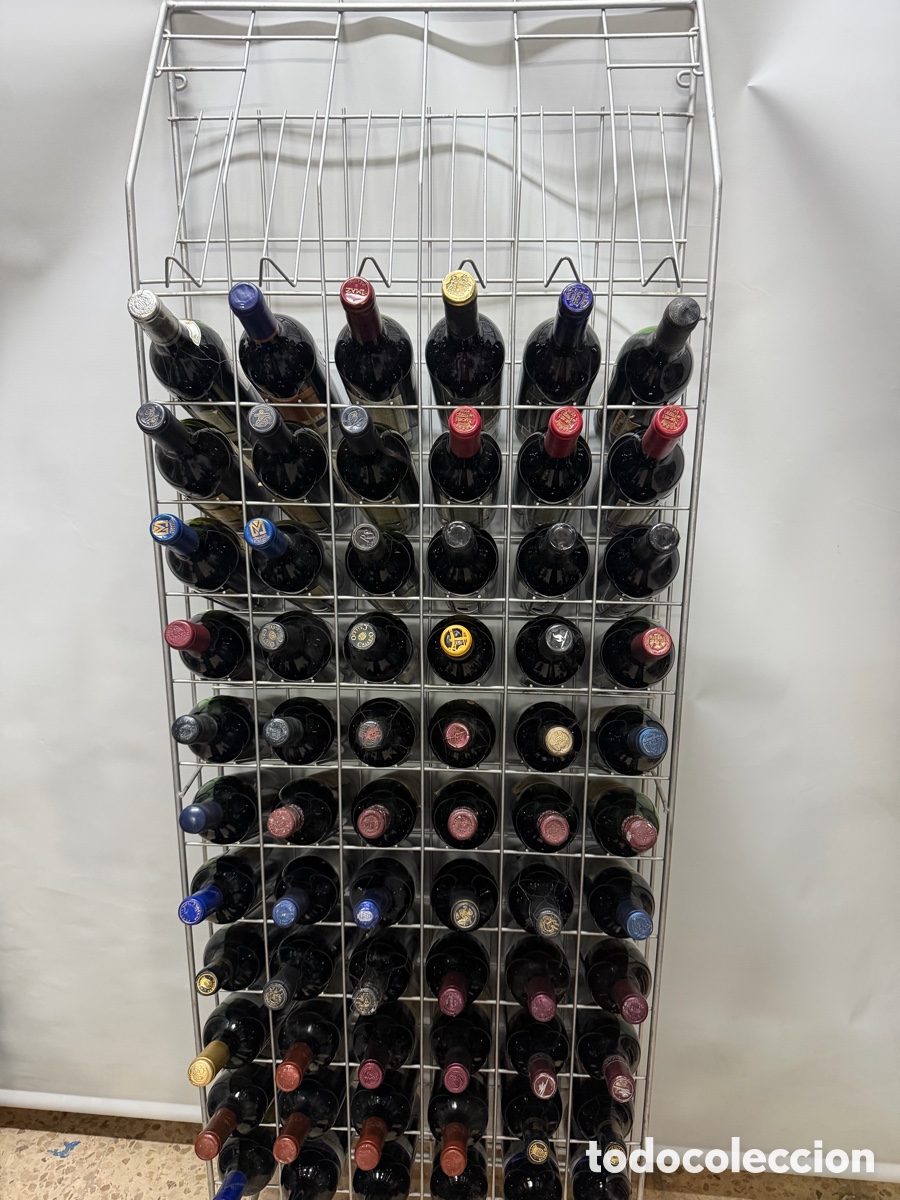 Coleccionismo de vinos y licores: Lote de 66 botellas de vino + botellero met&aacute;lico